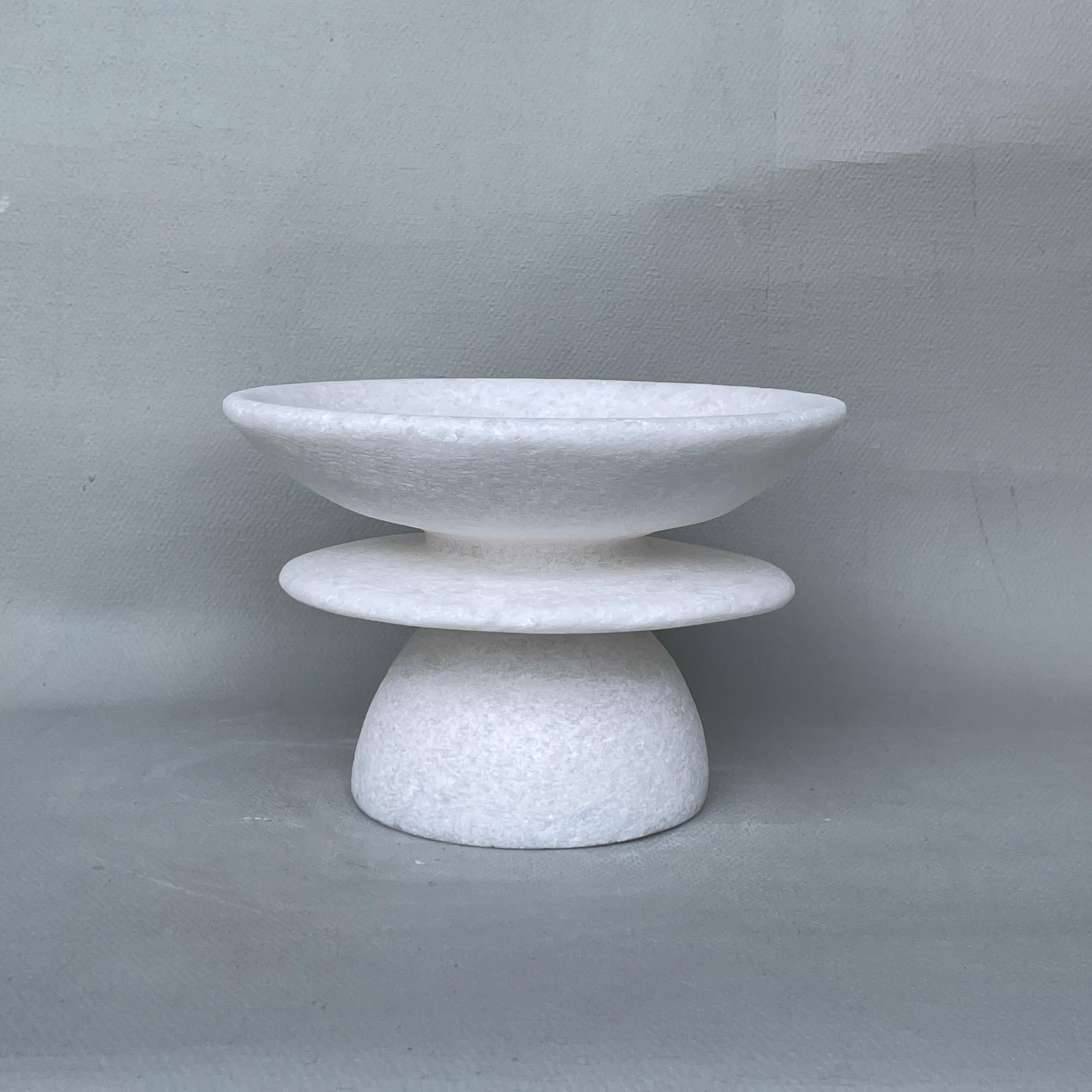 Unique Naxian Marble Vessel by Tom Von Kaenel
Unique piece.
Dimensions: Ø 17.5 x H 12 cm.
Materials: Naxian marble.

The surfaces of the objects are not sealed, they are not protected against acid. The lines of the handcraft are visible it
