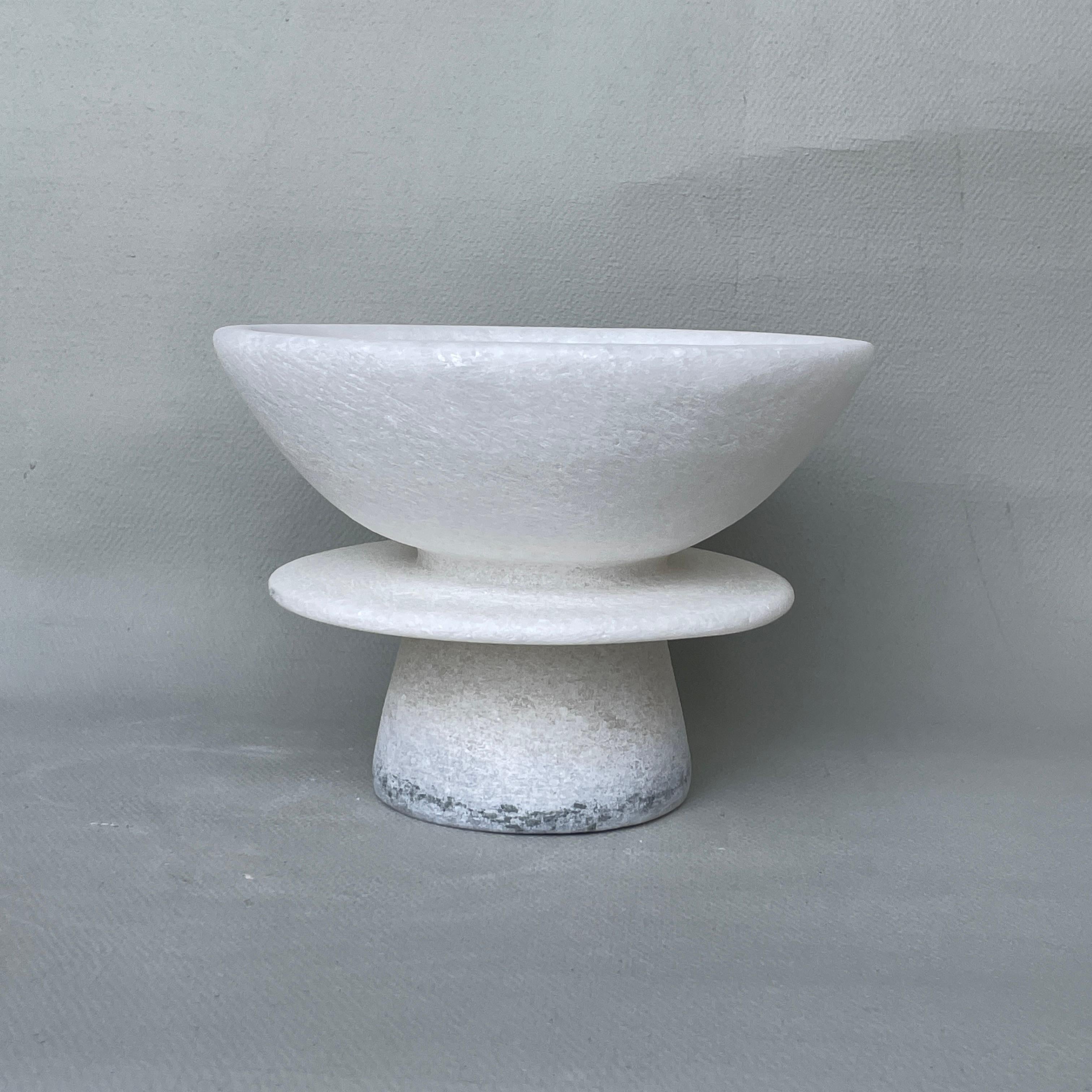 Unique Naxian Marble Vessel by Tom Von Kaenel
Unique piece.
Dimensions: Ø 18 x H 13 cm.
Materials: Naxian marble.

The surfaces of the objects are not sealed, they are not protected against acid. The lines of the handcraft are visible it gives