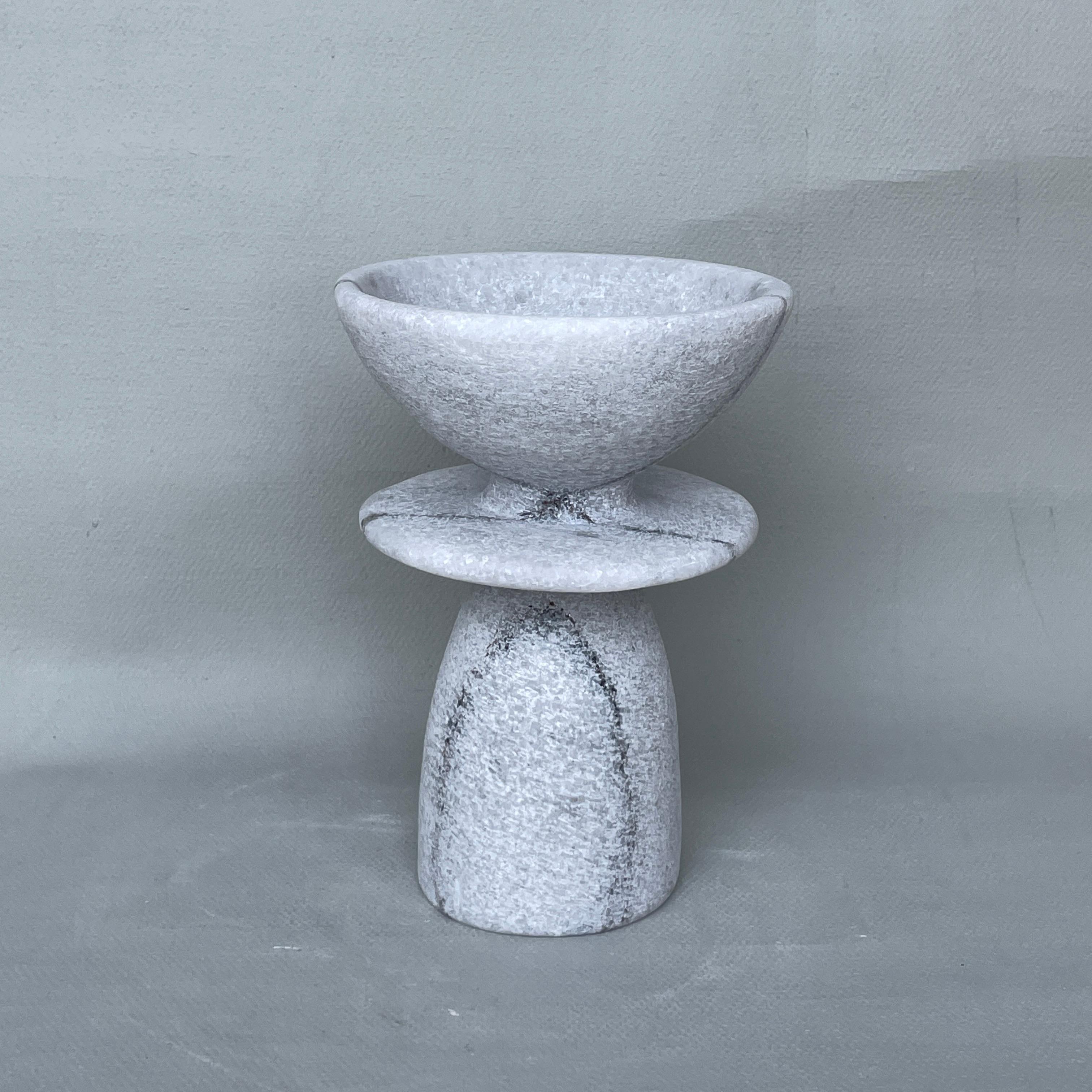 Unique Naxian Marble Vessel by Tom Von Kaenel
Unique piece.
Dimensions: Ø 12.5 x H 18 cm.
Materials: Naxian marble.

The surfaces of the objects are not sealed, they are not protected against acid. The lines of the handcraft are visible it