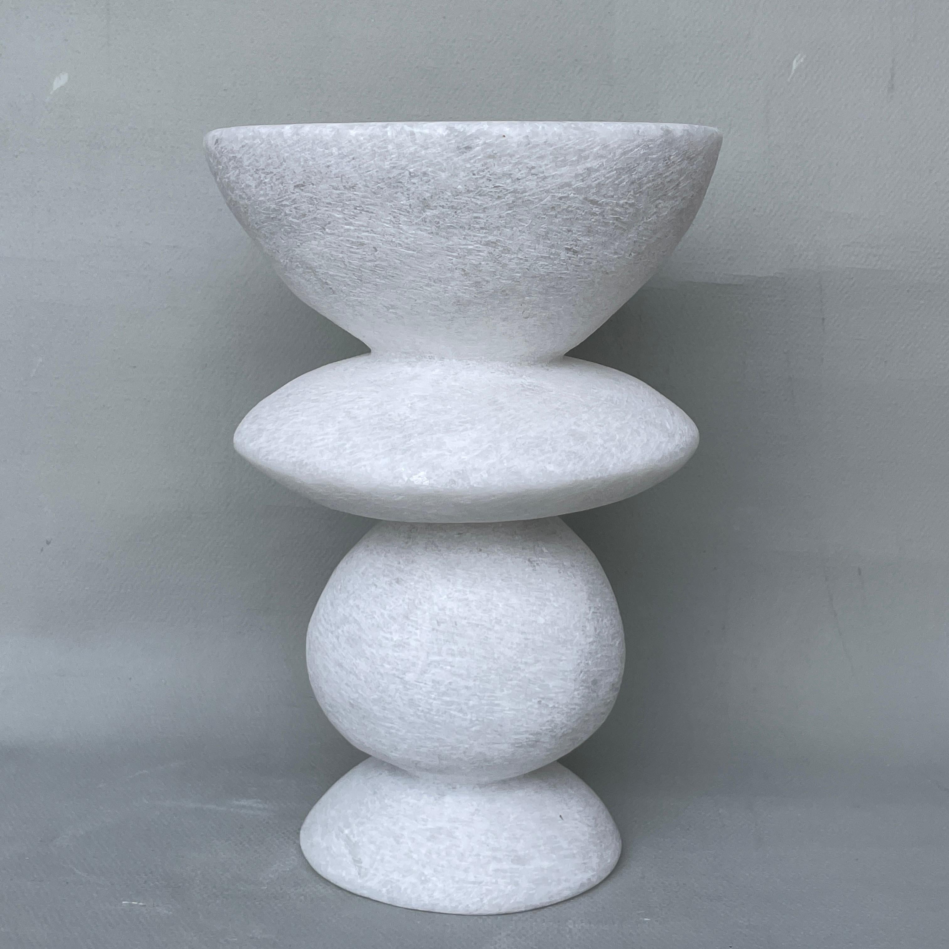 Unique Naxian Marble Vessel by Tom Von Kaenel
Unique piece.
Dimensions: Ø 17 x H 25 cm.
Materials: Naxian marble.

The surfaces of the objects are not sealed, they are not protected against acid. The lines of the handcraft are visible it gives