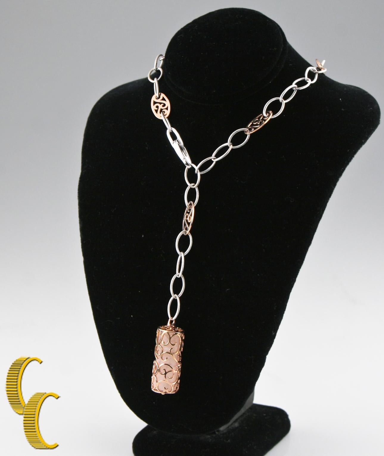 Gorgeous, Unique 14k Gold Necklace
Features White Gold Cable Chain w/ Ornate Rose Gold Accent Chains
Features Rose Gold Cylinder Container w/ Gorgeous, Marbled Pink Coral Contained Within
Dimensions of Container = 27 mm Long x 11 mm Diameter
Total