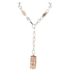 Unique Necklace Featuring Coral Pendant in Cage Set in 14k White and Rose Gold