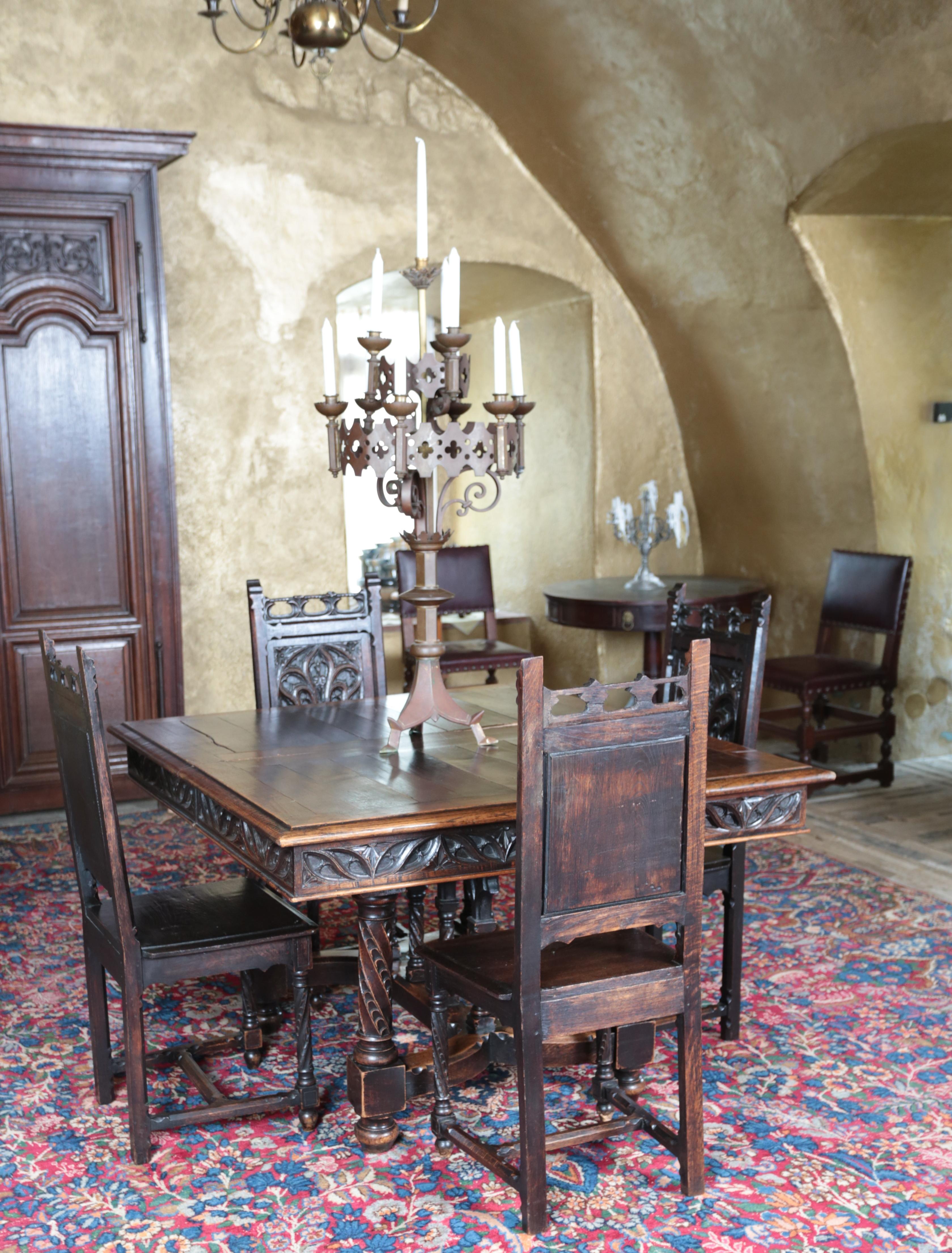 Carved Unique neo-Gothic dining room, large table and 10 chairs For Sale