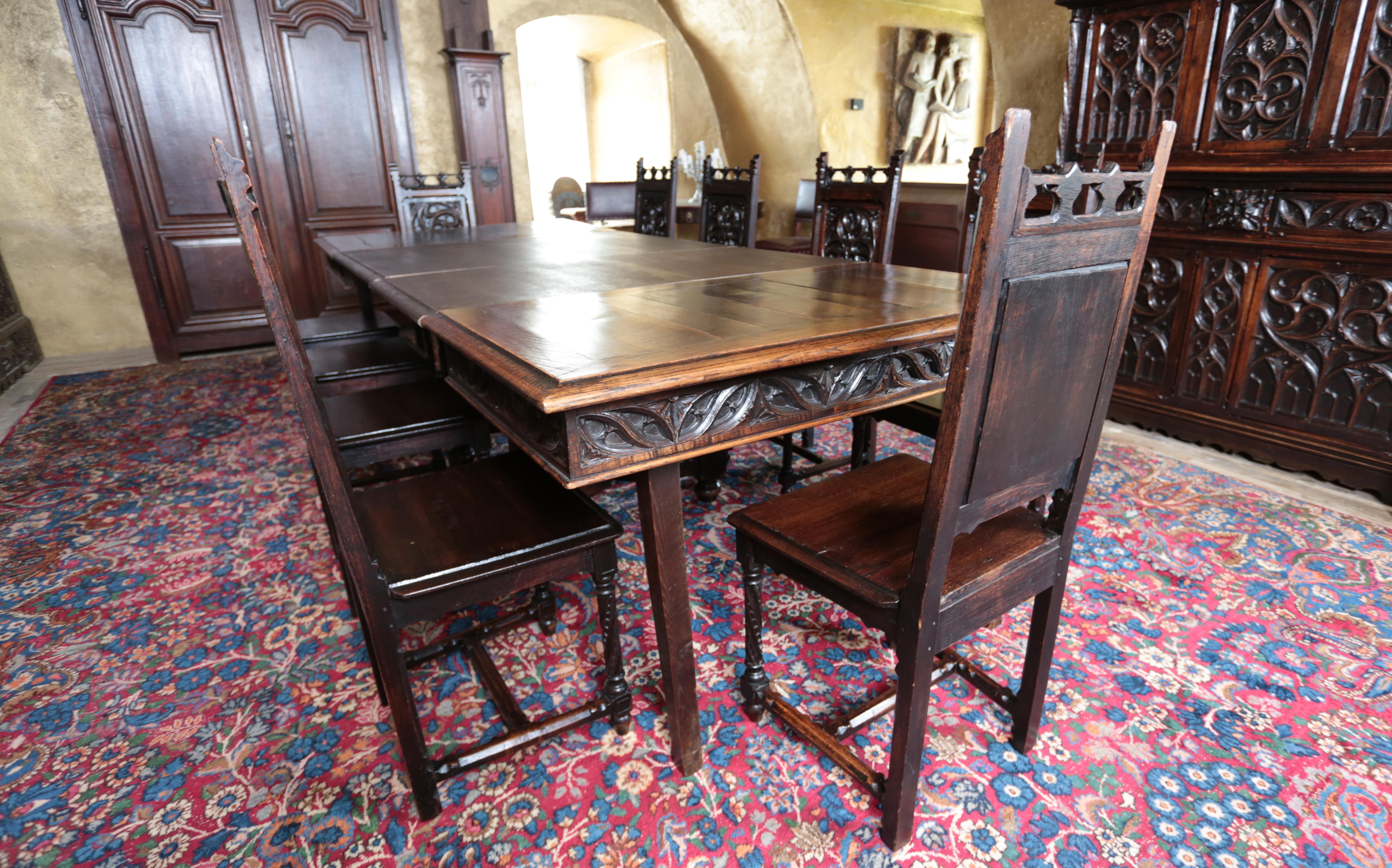 French Unique neo-Gothic dining room, large table and 10 chairs For Sale
