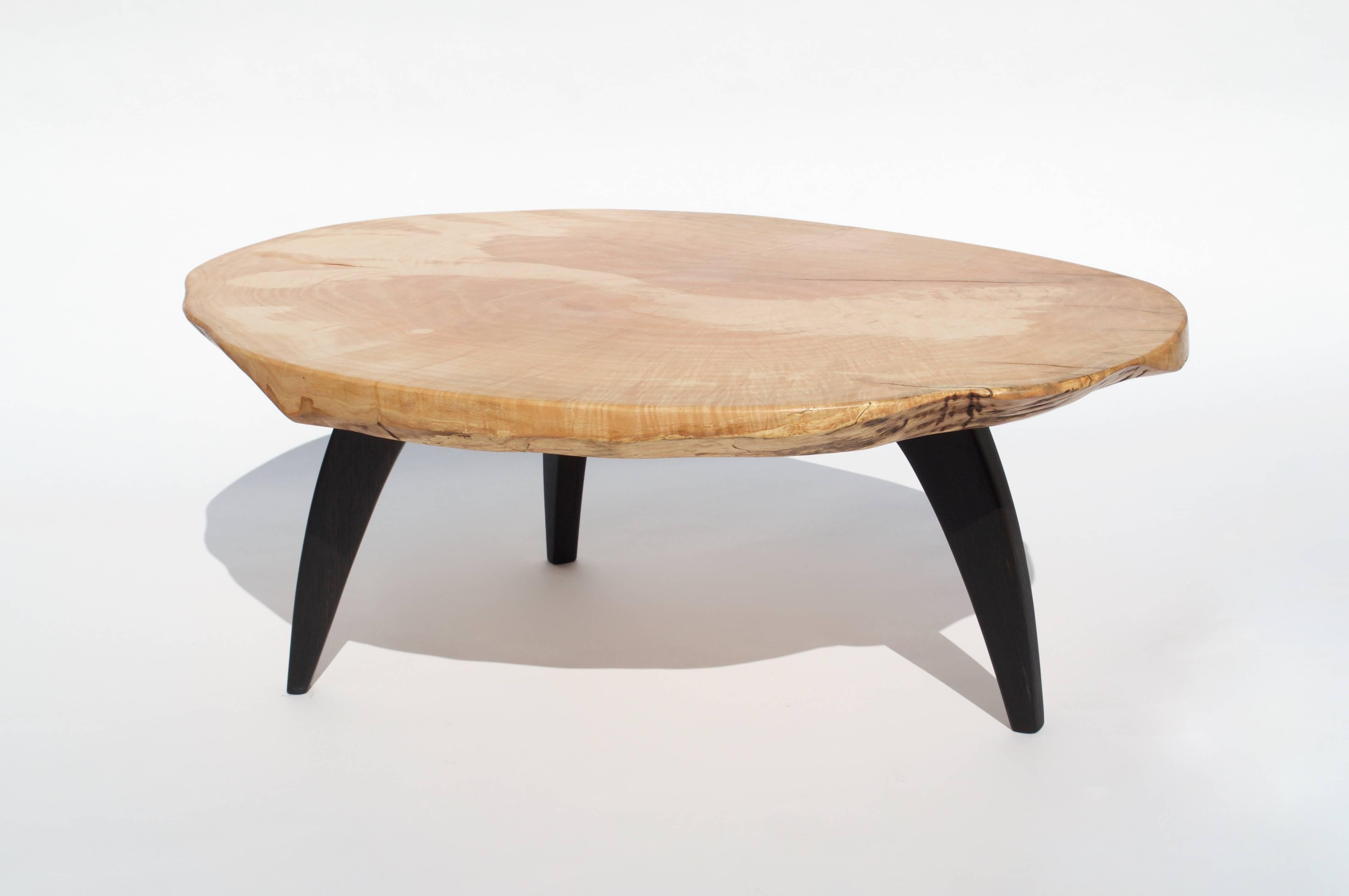 Unique signed table by Jörg Pietschmann
Table, elm, bog oak
Measures: H 38 x W 101 x D 73 cm
Side piece of an old oak with exceptional elm colorful legs. 

In Pietschmann’s sculptures, trees that for centuries were part of a landscape and