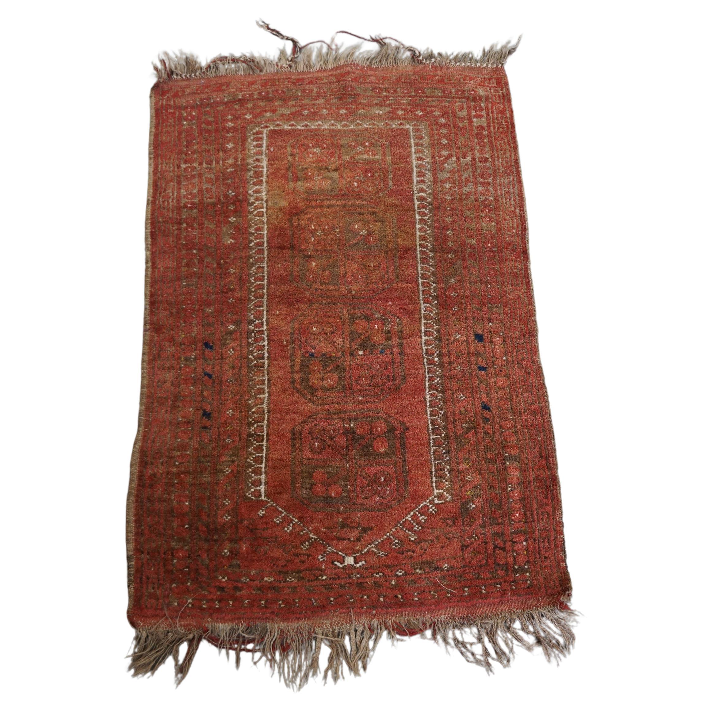 Alfombra oriental antigua única con tonos principalmente rojos 119x73cm