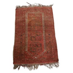 Alfombra oriental antigua única con tonos principalmente rojos 119x73cm