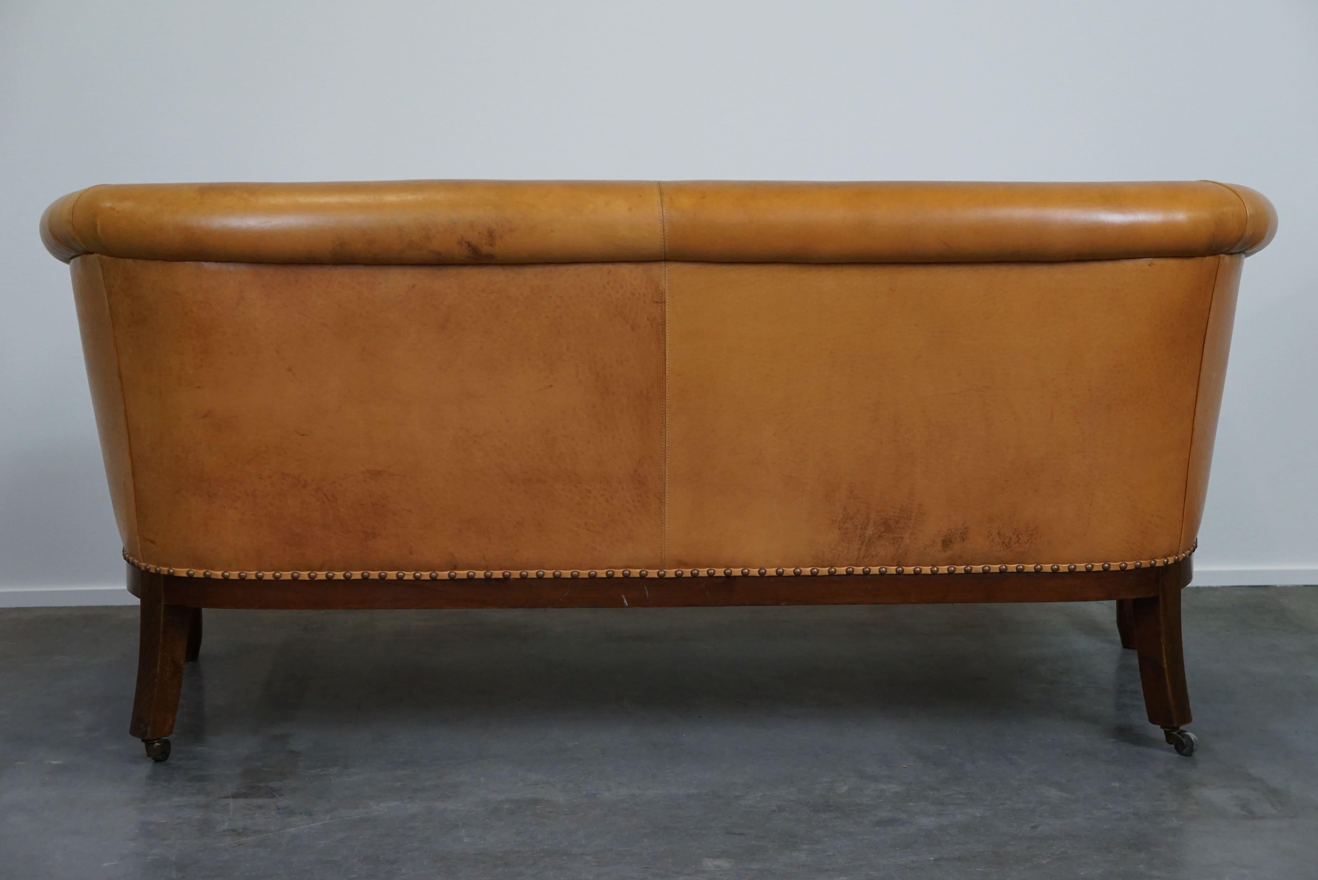 20th Century Unique old set of 2 club armchairs and a sofa in cognac-colored leather  For Sale