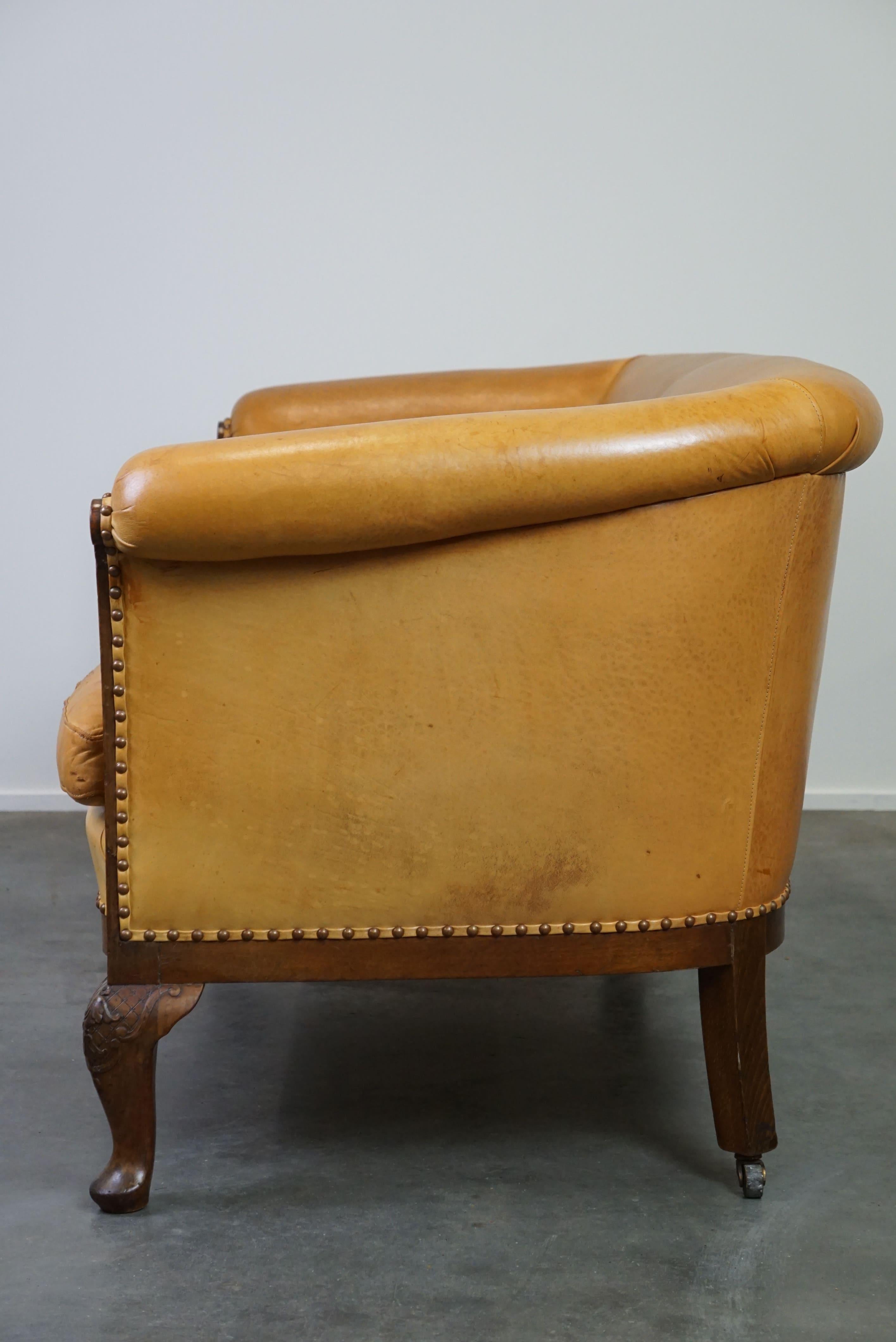 Leather Unique old set of 2 club armchairs and a sofa in cognac-colored leather  For Sale