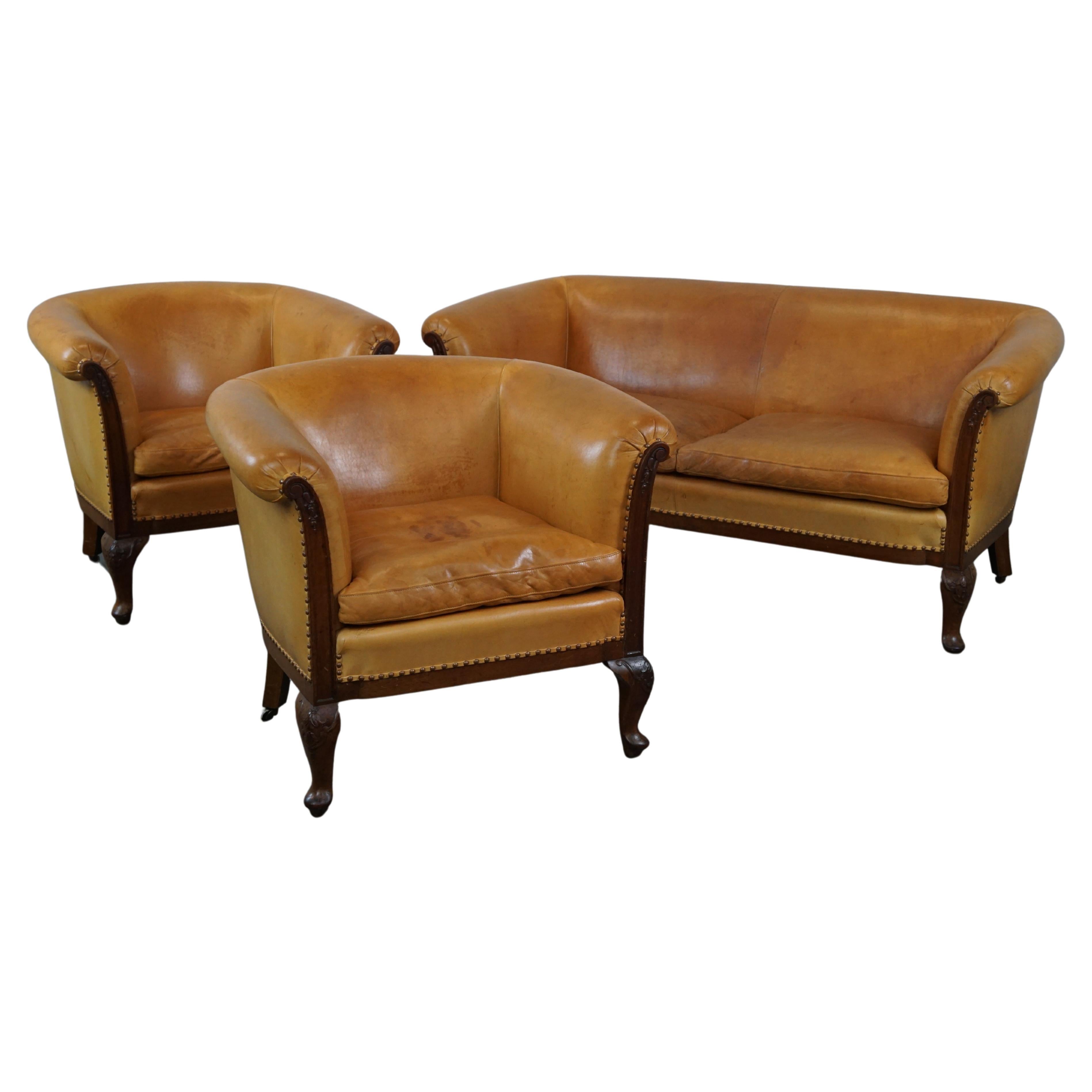 Unique old set of 2 club armchairs and a sofa in cognac-colored leather  For Sale