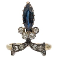 Unique old "tiara" ring with sapphire and diamonds, early 20th century.