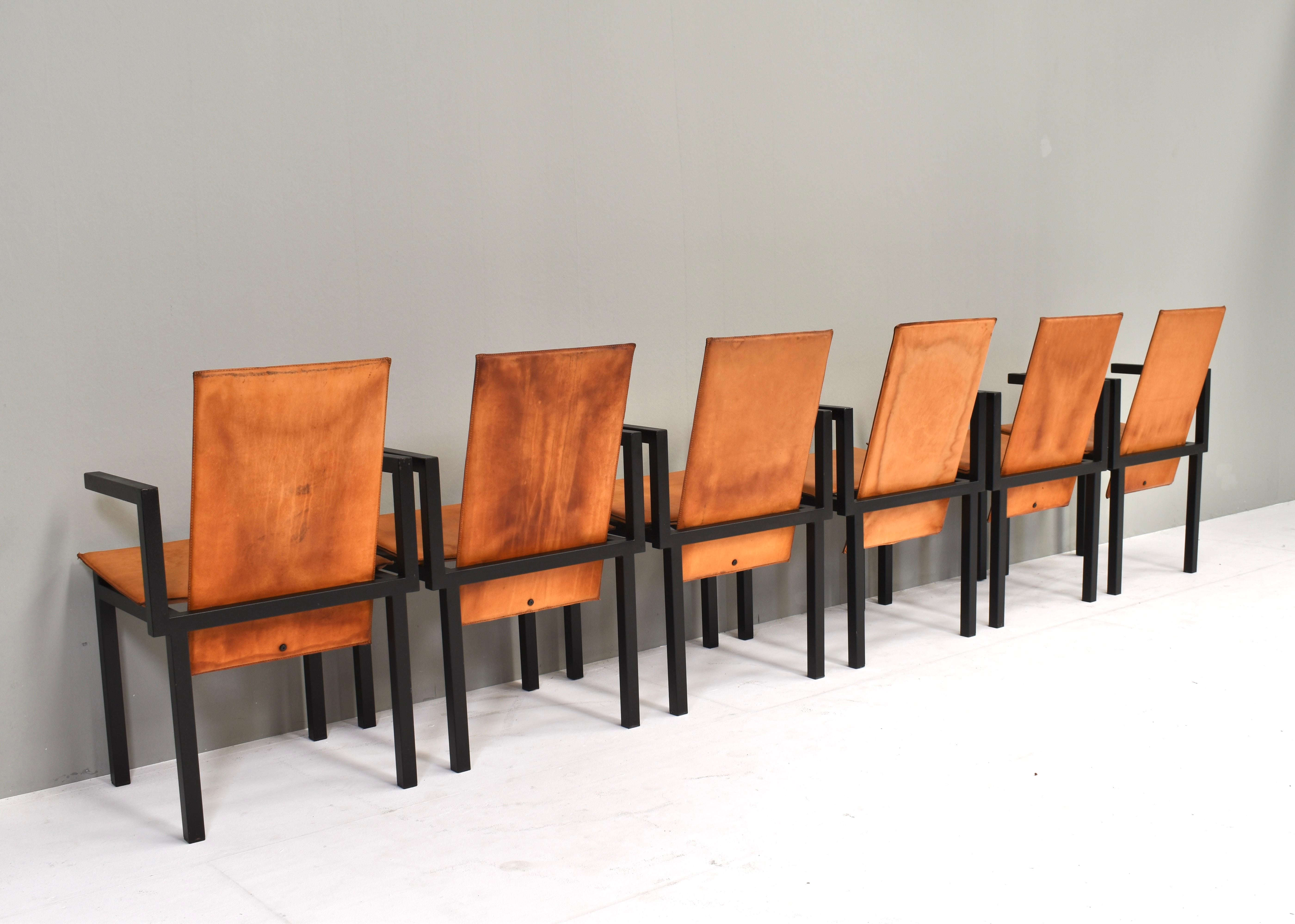 Unique one of a kind set of six dining chairs in tan cognac leather, circa 1970 For Sale 1
