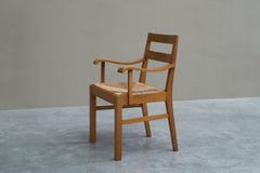 Sillón único Oscar Degeyter de madera maciza y junco Bélgica 1942