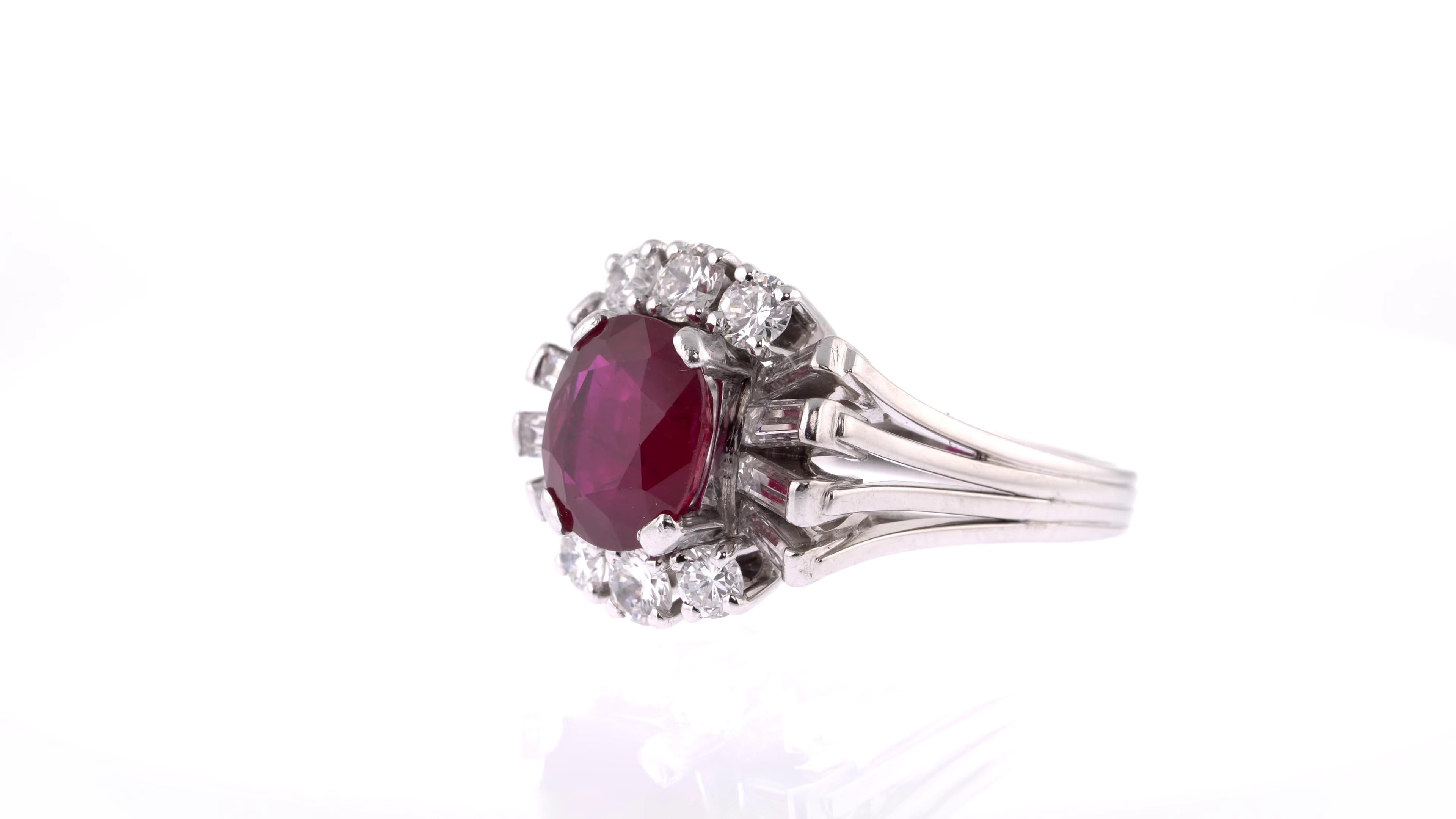 Oval Cut Unique Oval Red Ruby Ring in White Gold with White Diamond Surround For Sale