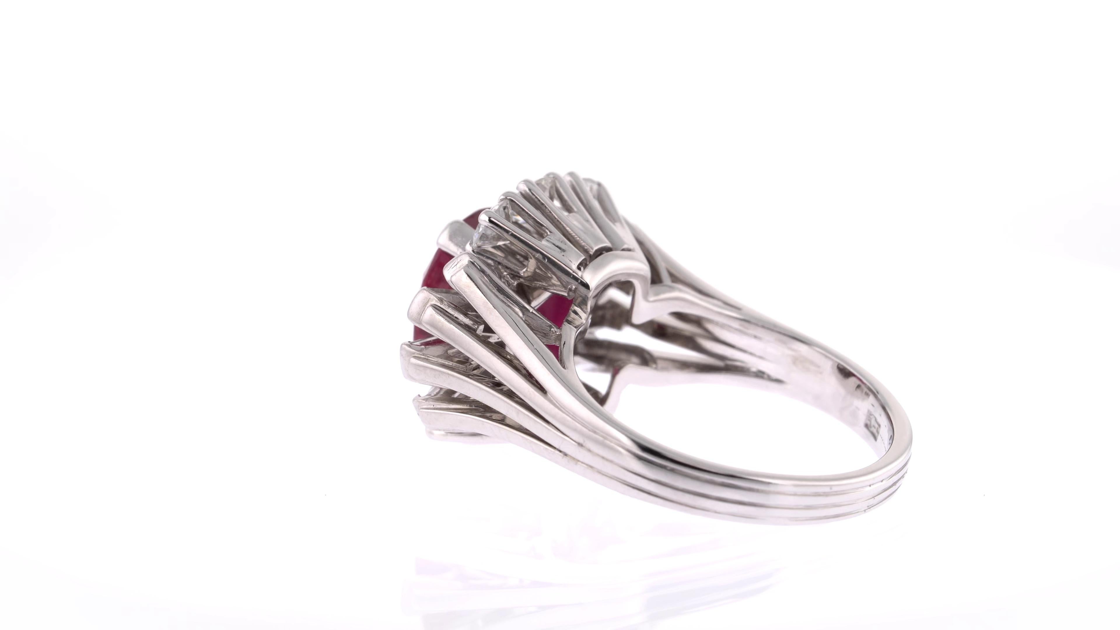 Unique Oval Red Ruby Ring in White Gold with White Diamond Surround In Excellent Condition For Sale In London, GB