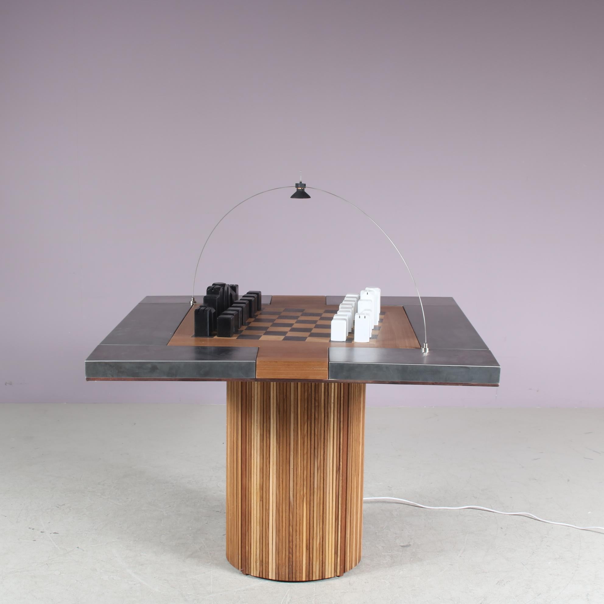 A unique and complete chess table, the “Pacifico”, designed by Franco Bozzi and Duccio Trassinelli / Studio A.R.D.I.T.I. in Italy, manufactured in 1973.

Made of high quality wood with metal, which gives the piece a fantastic modern style, but there
