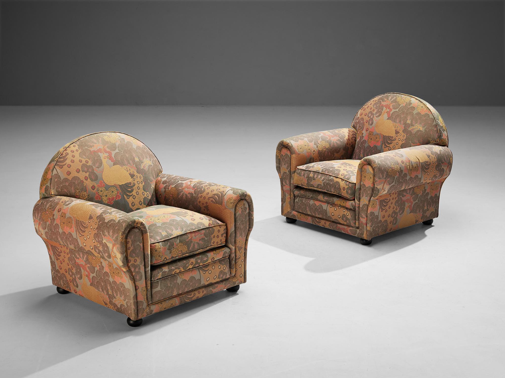 Armchairs, fabric, dark stained wood, Italy, 1930s

Not often one will come across such a delightful pair of Art Deco armchairs in original upholstery which is in overall good condition. Its botanical print will definitly swipe you off your feet. Or