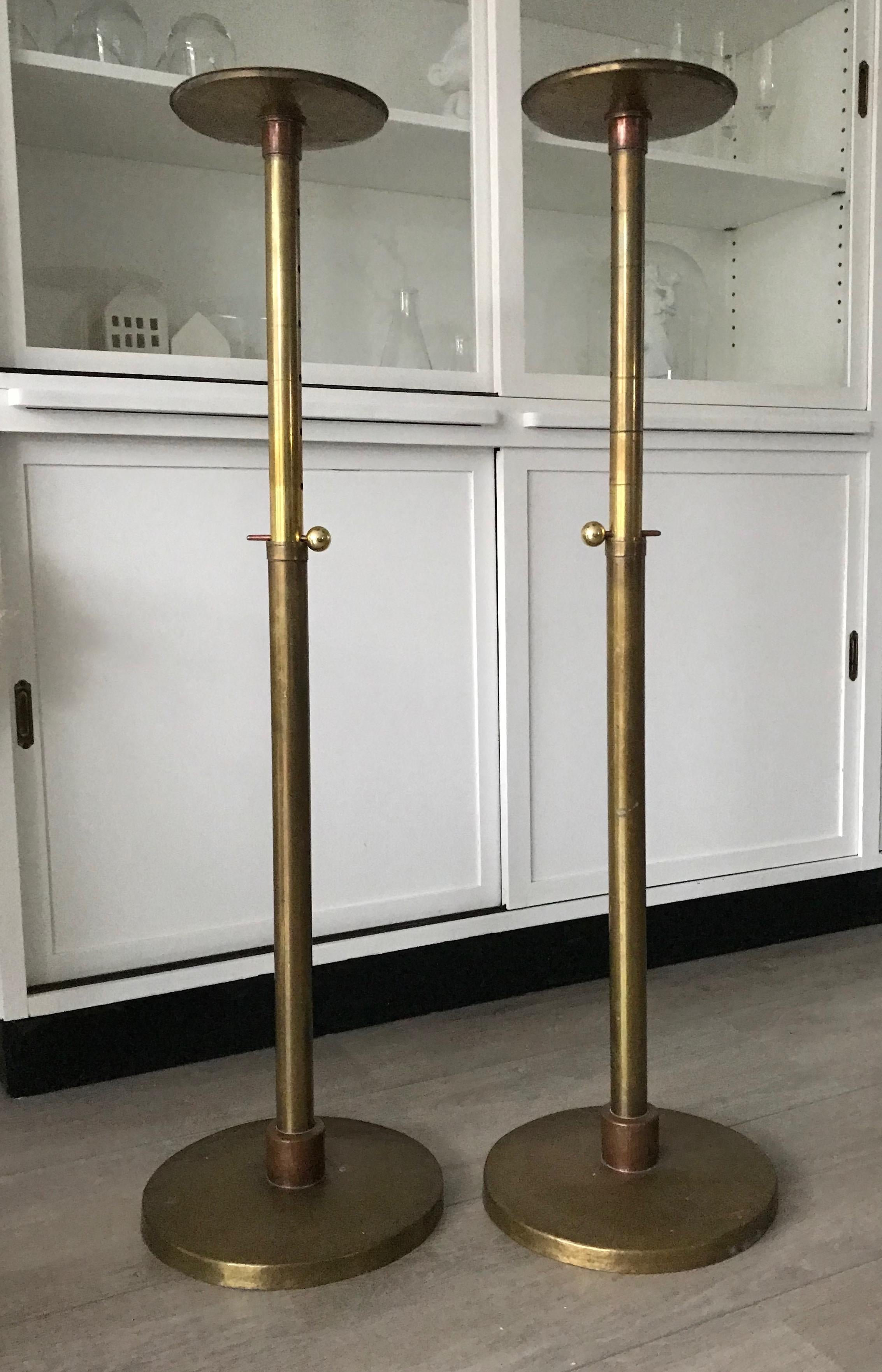 Identical, practical and quality crafted pair of adjustable pedestals.

This top quality pair of former Church stands was all hand-crafted around the turn of the century. This is also why the brass and copper now have the most incredible patina.