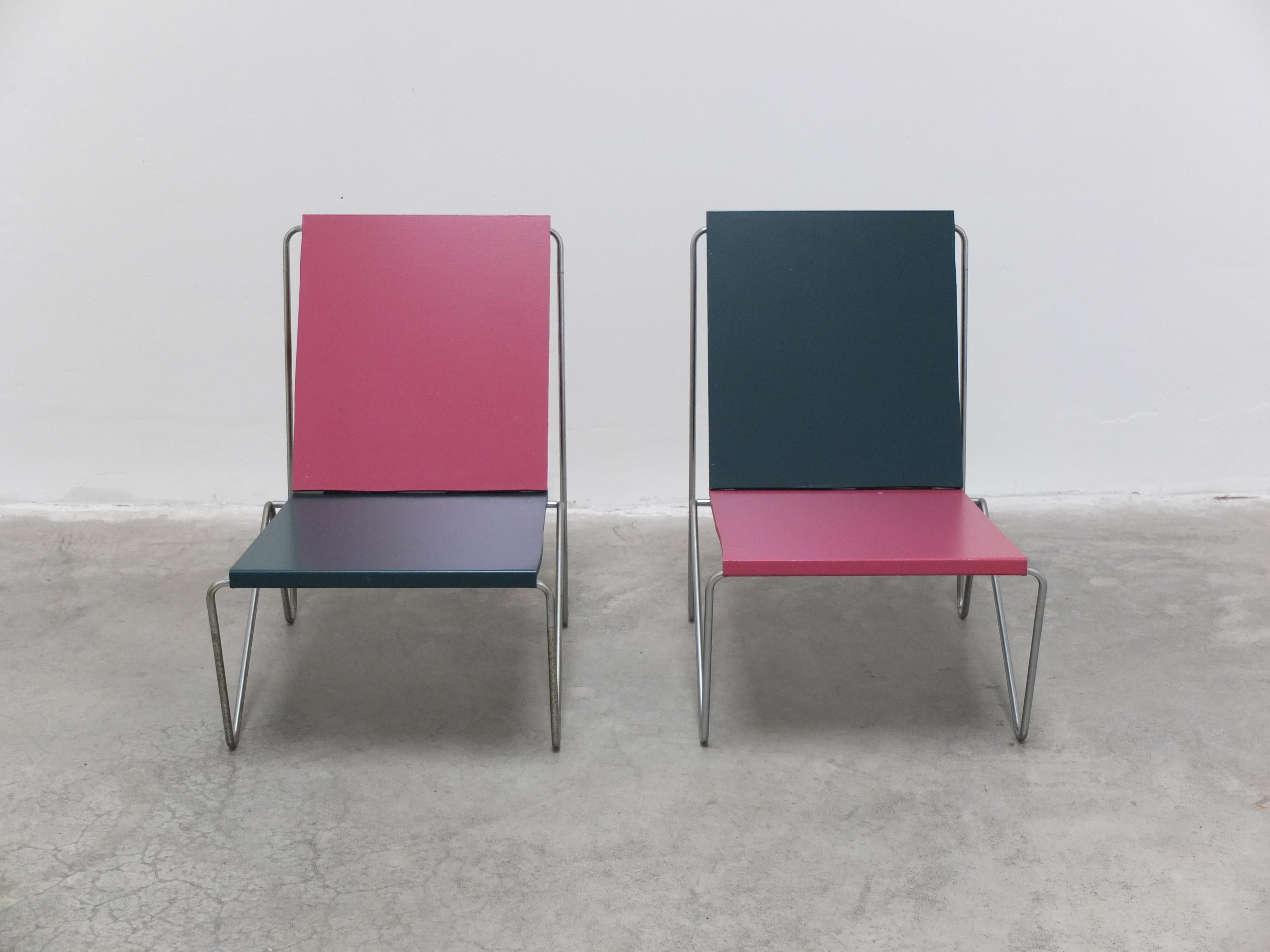 Unique pair of ‘Bachelor’ chairs designed by Verner Panton for Fritz Hansen in 1953. These examples were bought around 1971 together with a rare matching table which still has the label with production year. The chairs have a signature minimalist