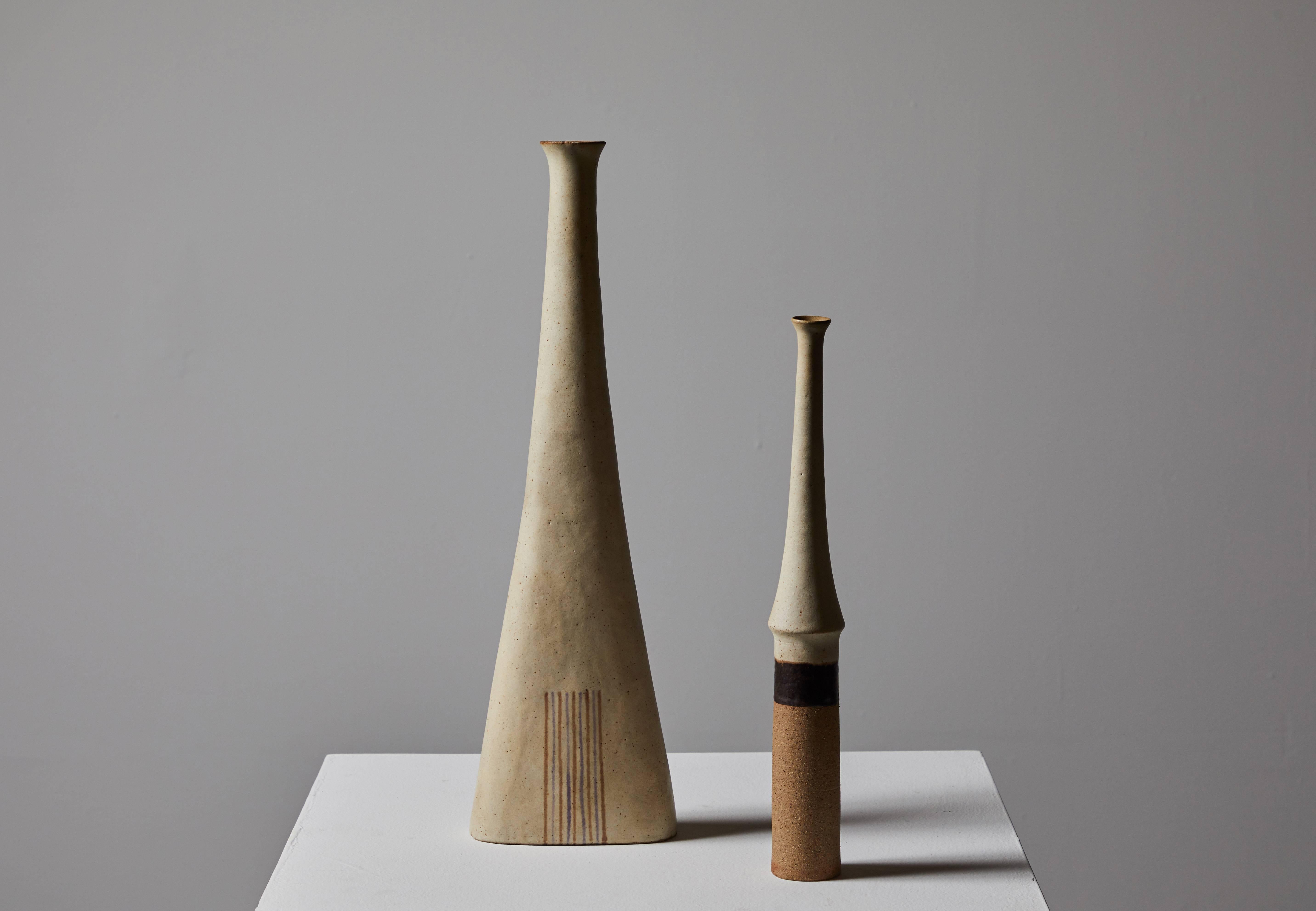 Pair of vases signed by Italian ceramicist Bruno Gambone. Glazed signature to underside. Made in Italy, circa 1960s.

Smaller vase measures 2