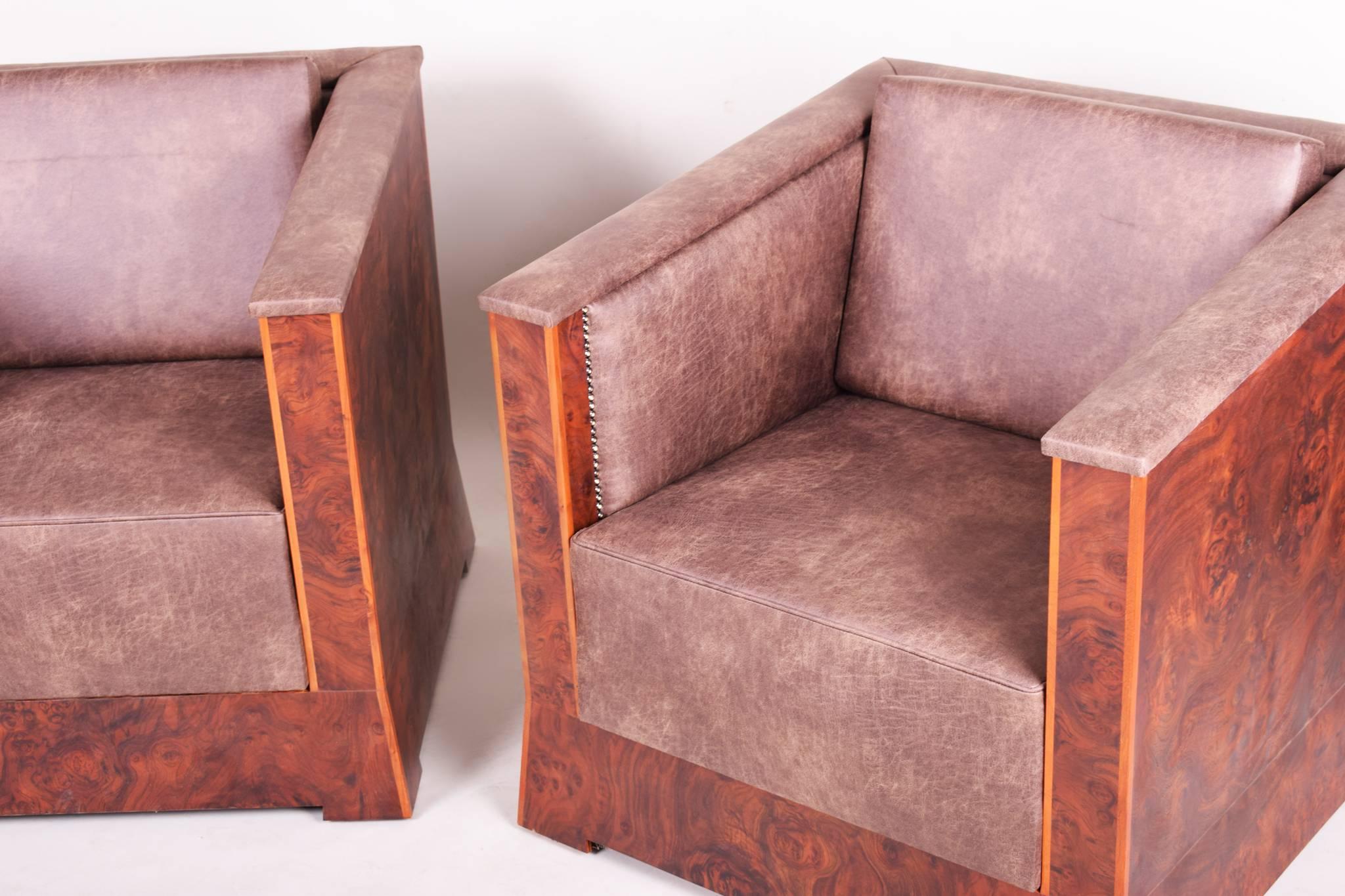 Pair of cubist armchairs.
Completely restored, surface made by Shellac politure.
 
We guarantee safe a the cheapest air transport from Europe to the whole world within 7 days.
The price is the same as for ship transport but delivery time is really