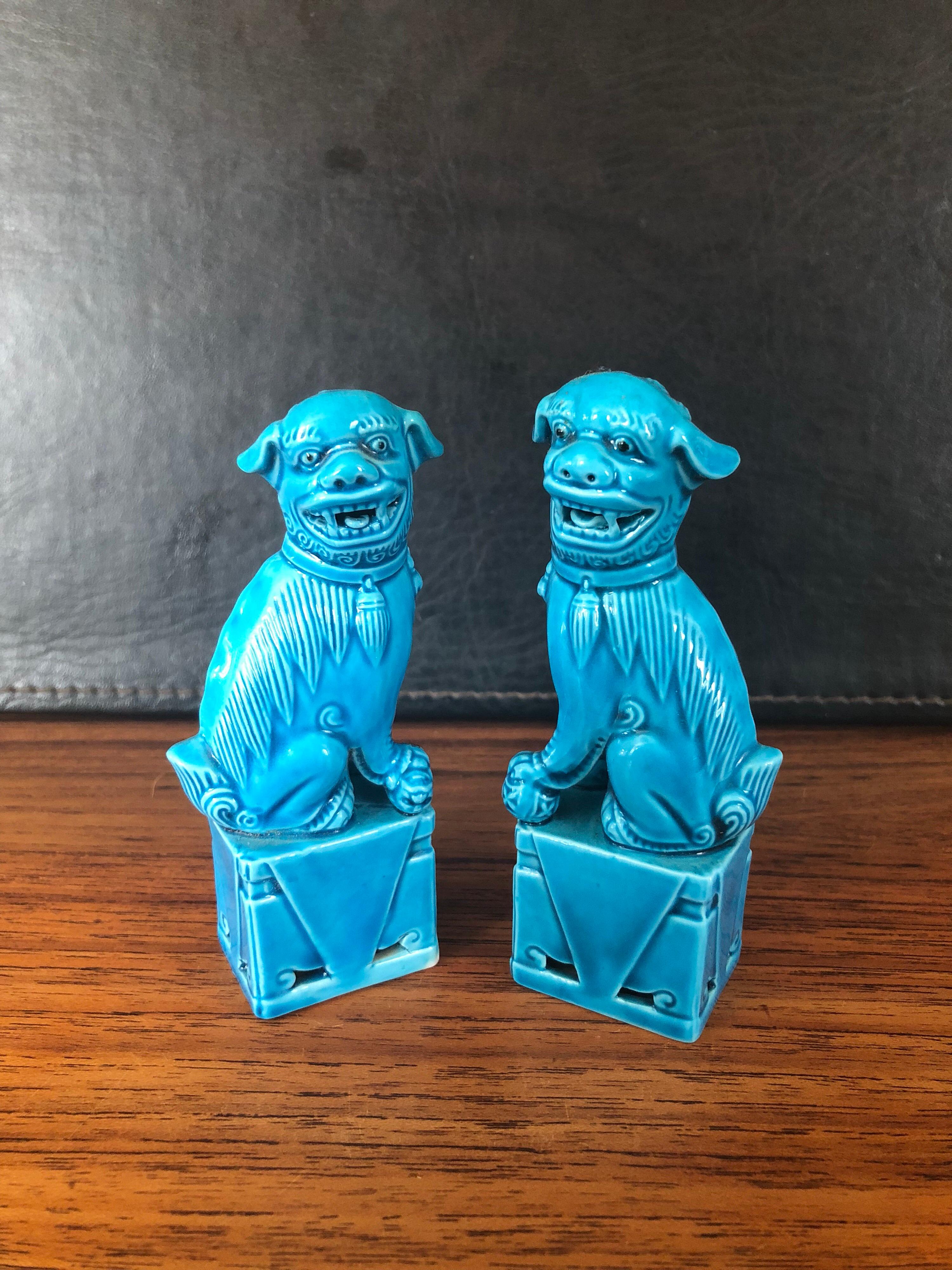 A very nice pair of vintage, mini, turquoise blue, ceramic foo dogs, circa 1970s. Excellent condition and patina; makes a fun decor item in any room!