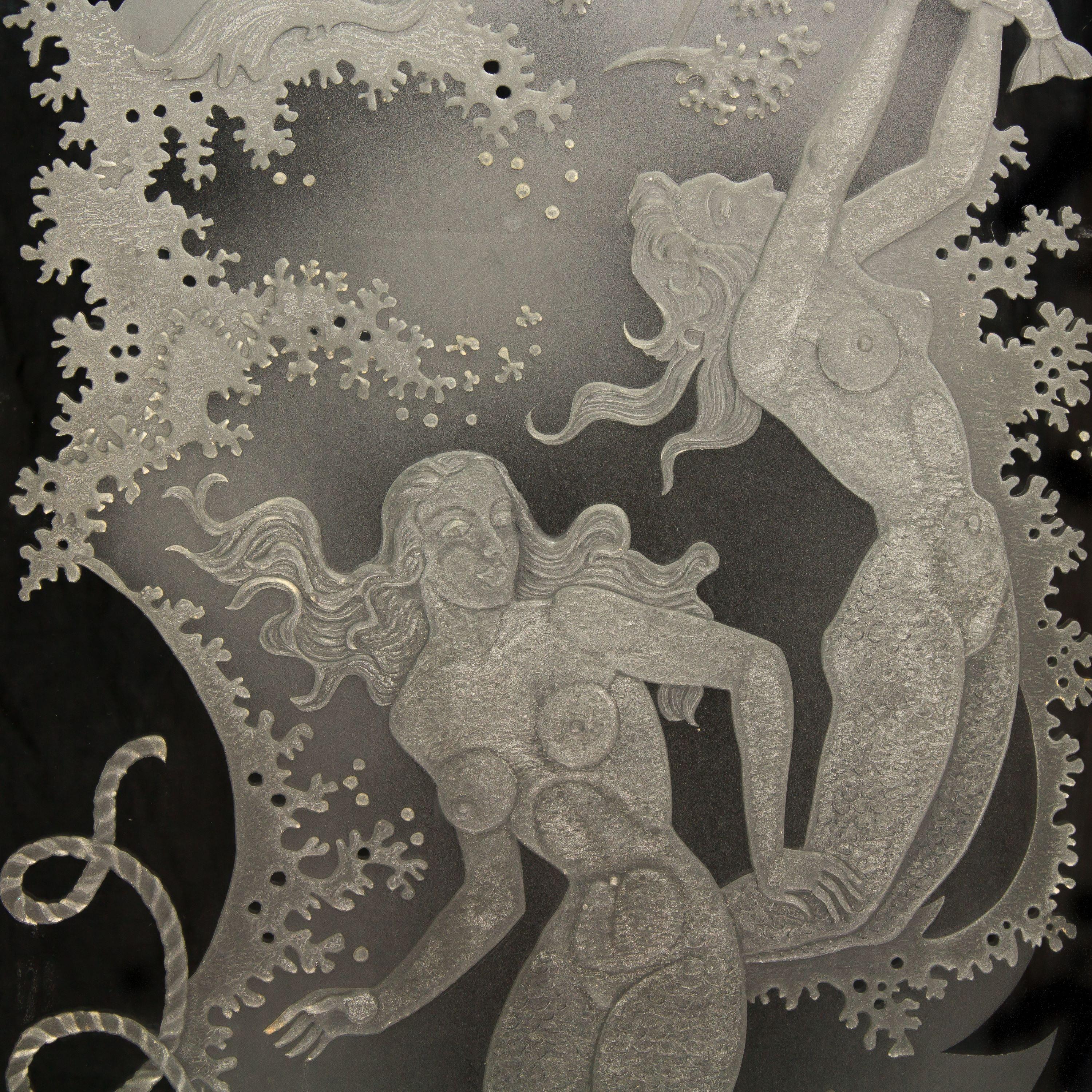The thick sandblasted, etched and acid-etched glass depicting mermaids, dolphins and ocean scenes. Designed for the Henriksbergs Restaurant in Gothenburg, Sweden.

This pair of glass panels were part of a larger collection of pairs, each of which