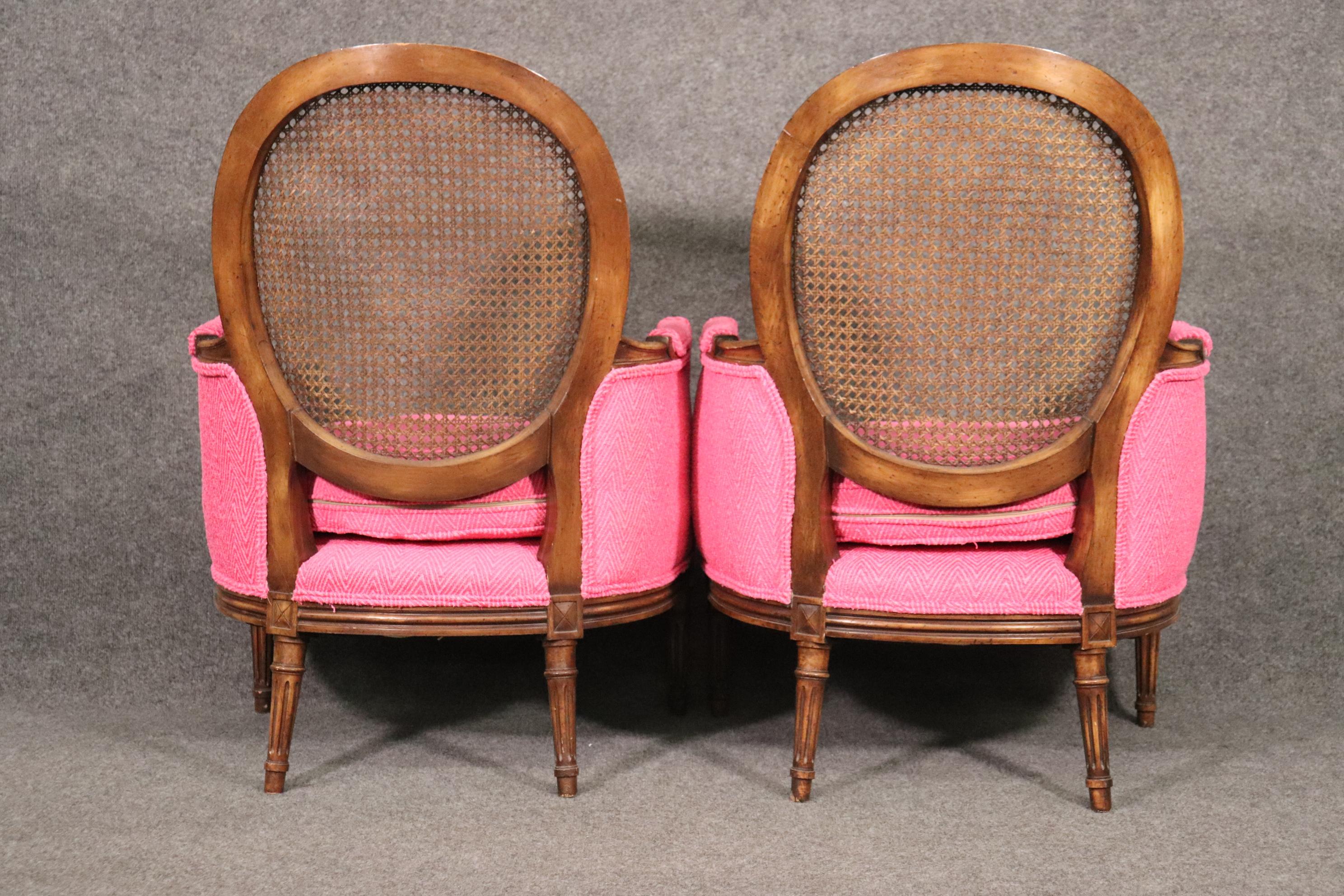 Mid-20th Century Unique Pair of French Louis XVI Style Walnut Cane Back Bergere Chairs Circa 1960