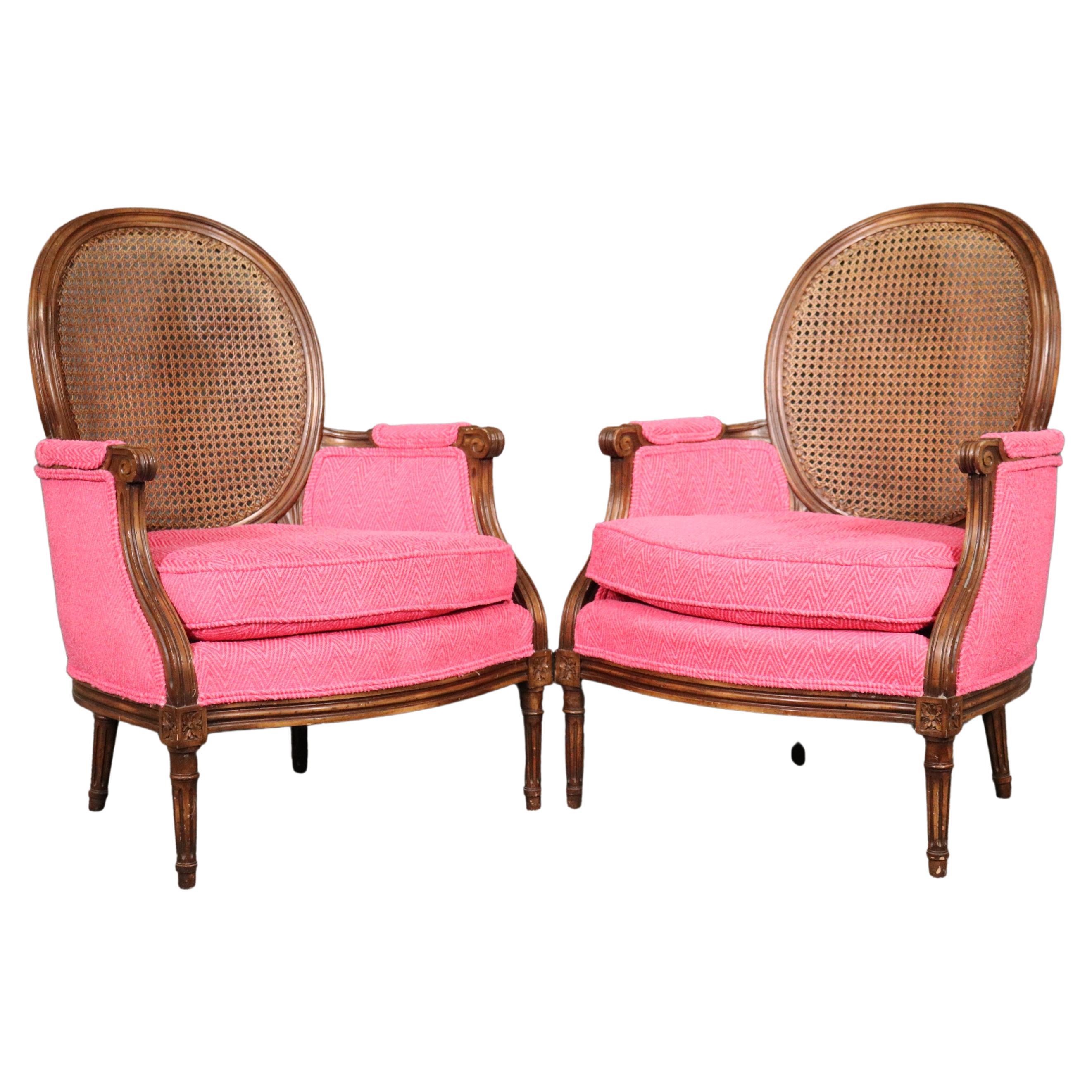 Unique Pair of French Louis XVI Style Walnut Cane Back Bergere Chairs Circa 1960