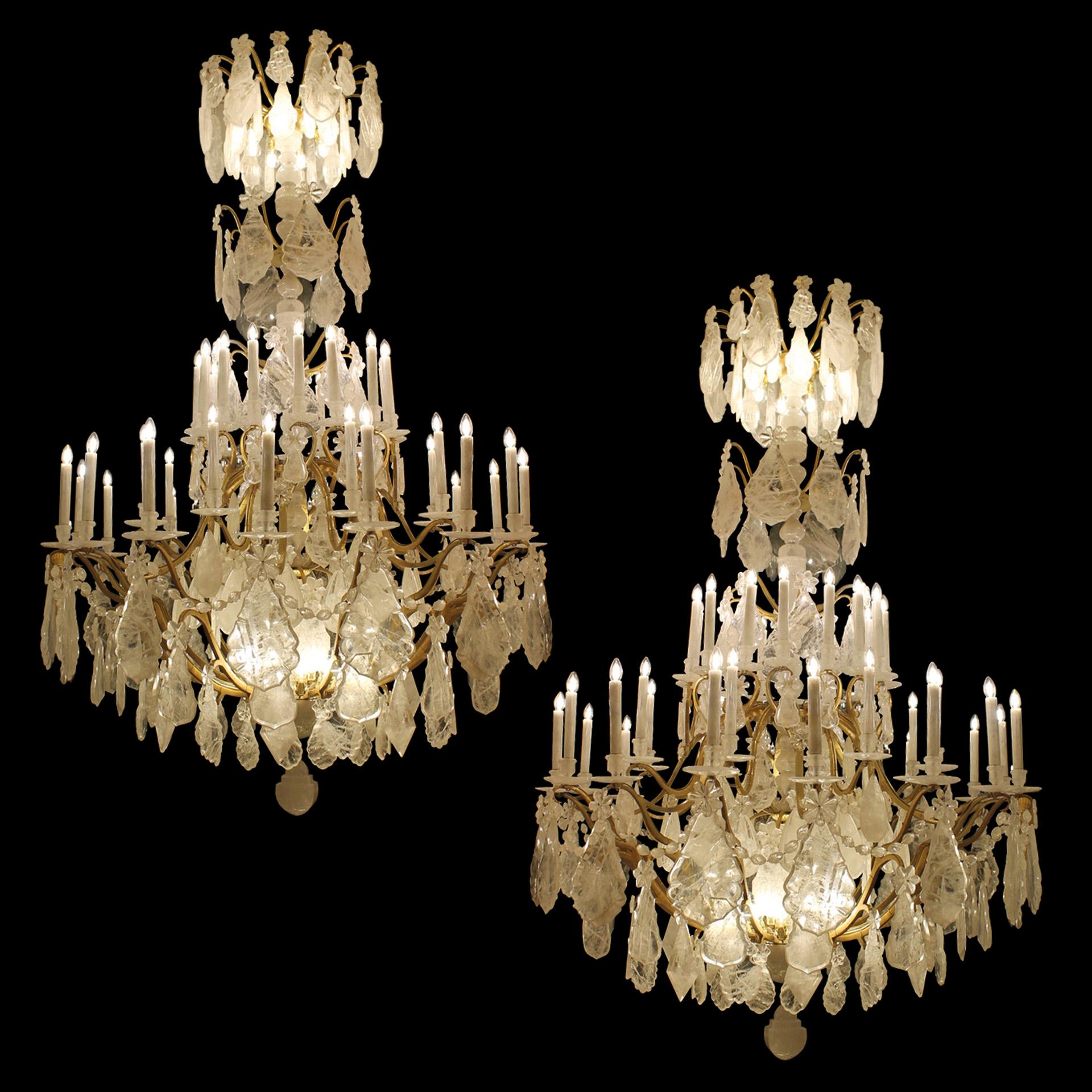 Amazing French  of antique grand rock crystal chandeliers in the Louis XV style. Original circa 1910 Gilt bronze frame with 80 lights, with a lovely aged finish, redressed in rock crystal by Dimitri Stefanov. Dimensions : Height 300 cm x 180 cm