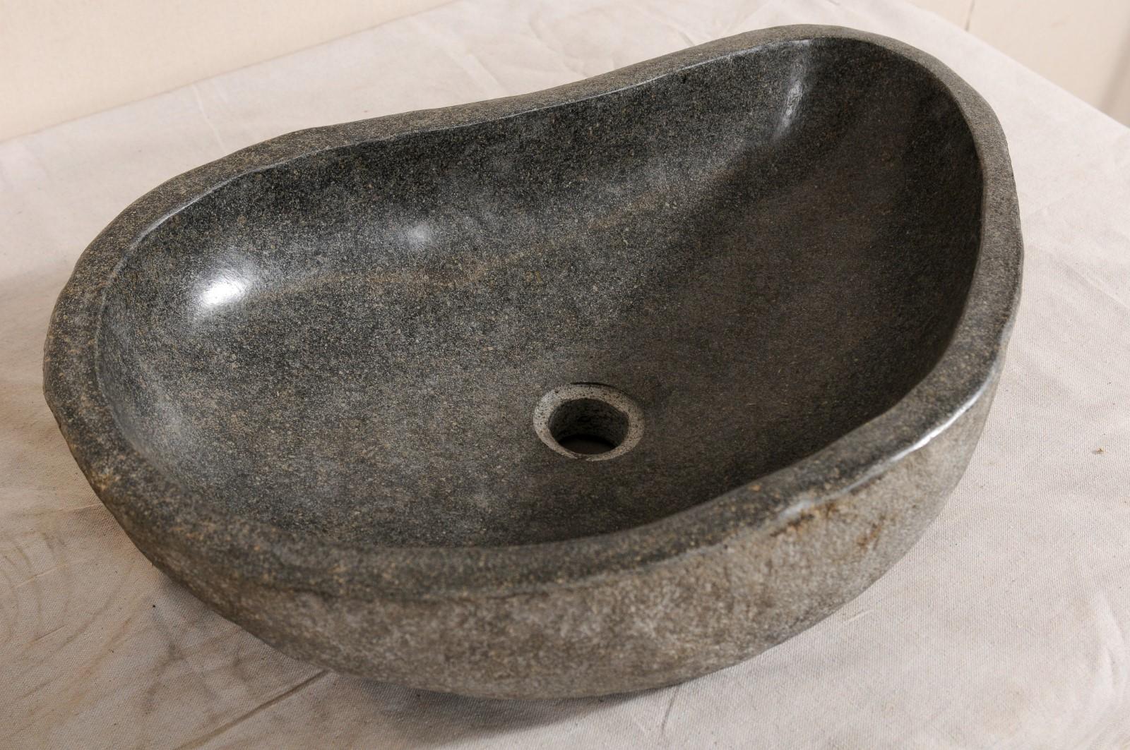 Carved Unique Pair of Polished River Rock Sinks For Sale
