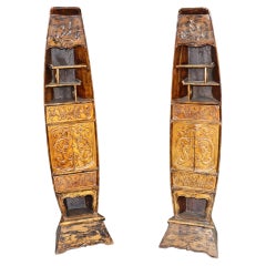 Antique Unique Pair of Teak Asian Carved Dragon Canoe Form Etagere Bookcases