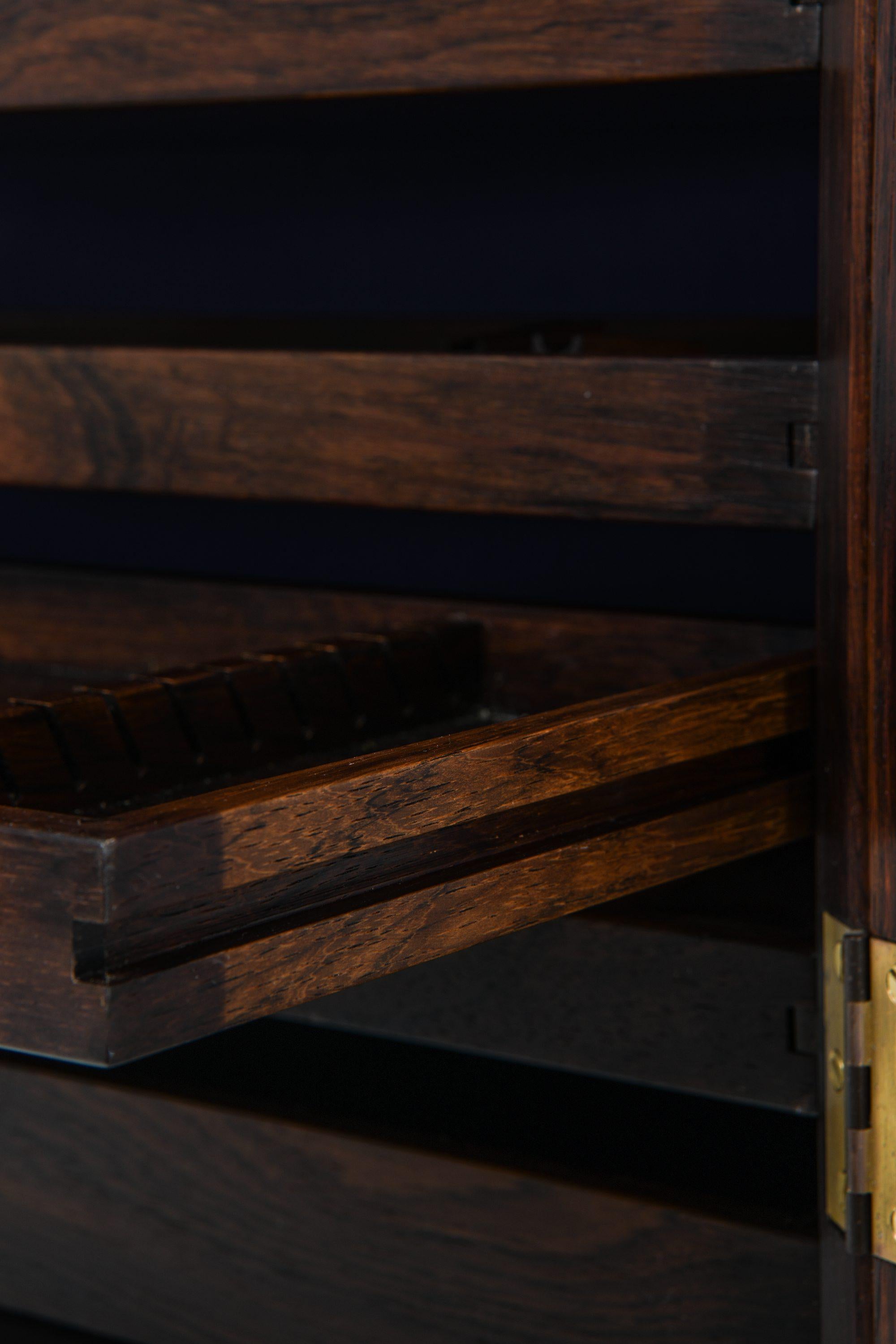 Unique Pair of Wall Mounted Cabinets in Rosewood and Glass by Poul Østergaard For Sale 2