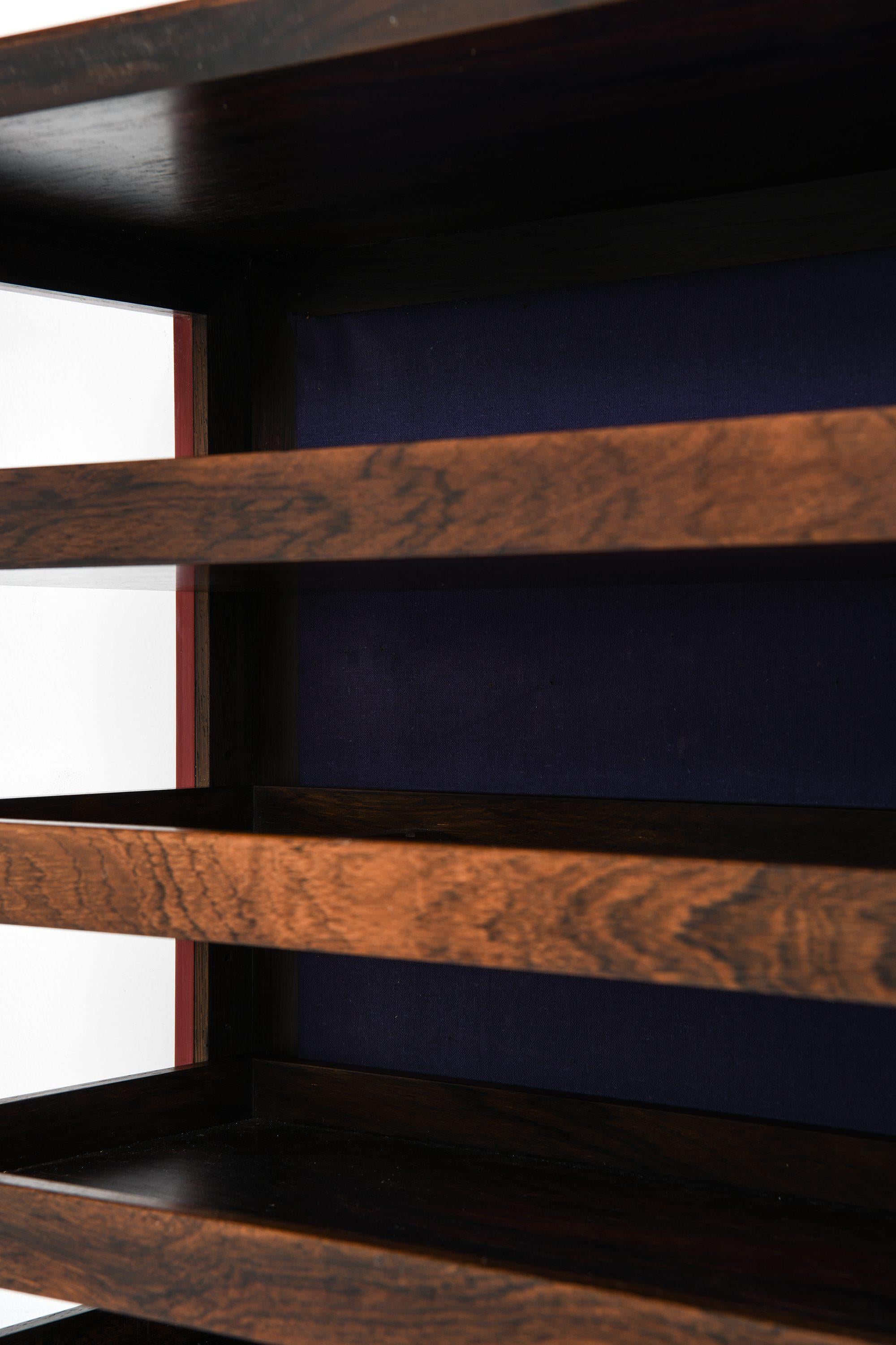 Unique Pair of Wall Mounted Cabinets in Rosewood and Glass by Poul Østergaard For Sale 3