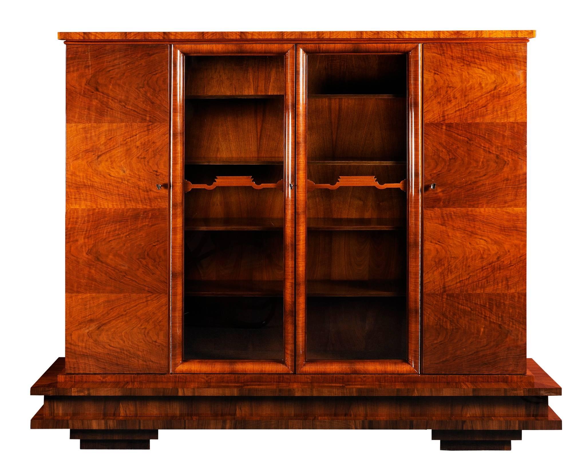 20th century Art Deco bookcases.
Completely restored to the high gloss.
Material: Walnut.

We guarantee safe a the cheapest air transport from Europe to the whole world within 7 days.
The price is the same as for ship transport but delivery time is