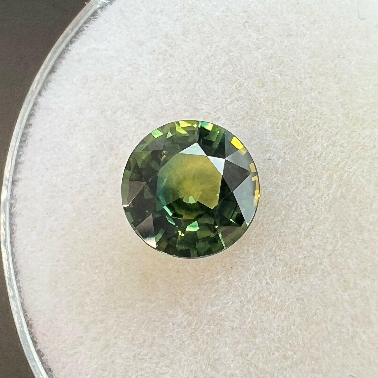 Unique Parti Bi Colour Sapphire 1.17ct Blue Yellow Green Round Loose Gem 6.2mm

Natural Greenish Yellow Blue Parti-Colour/Bi colour Sapphire Gemstone.
1.17 Carat with a beautiful blue green colour and excellent clarity, a very clean stone. Also has