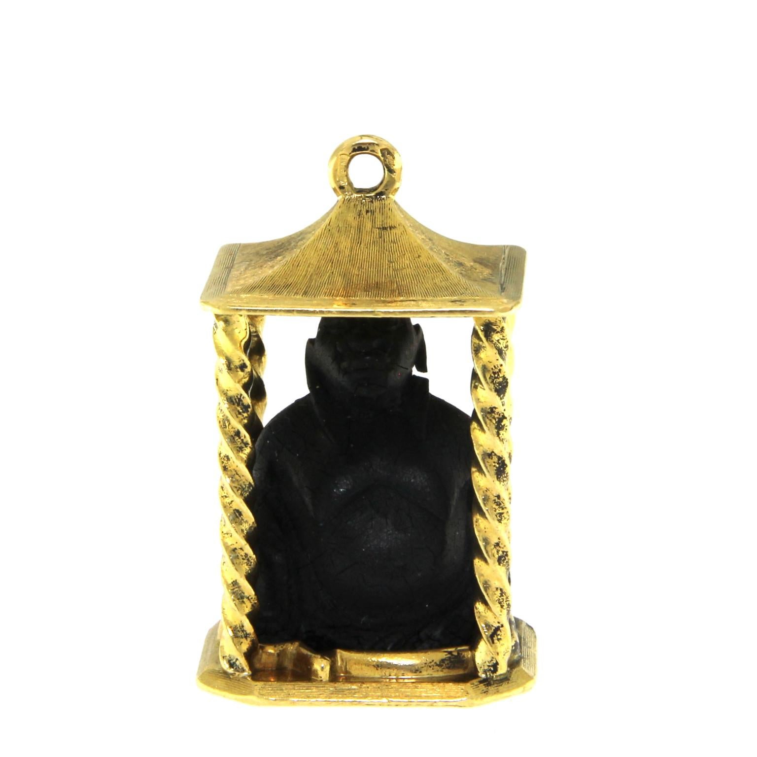 unique pendant 18K yellow gold and ebony

Ebony is engraved representing Buddah

total weigh is 15 g