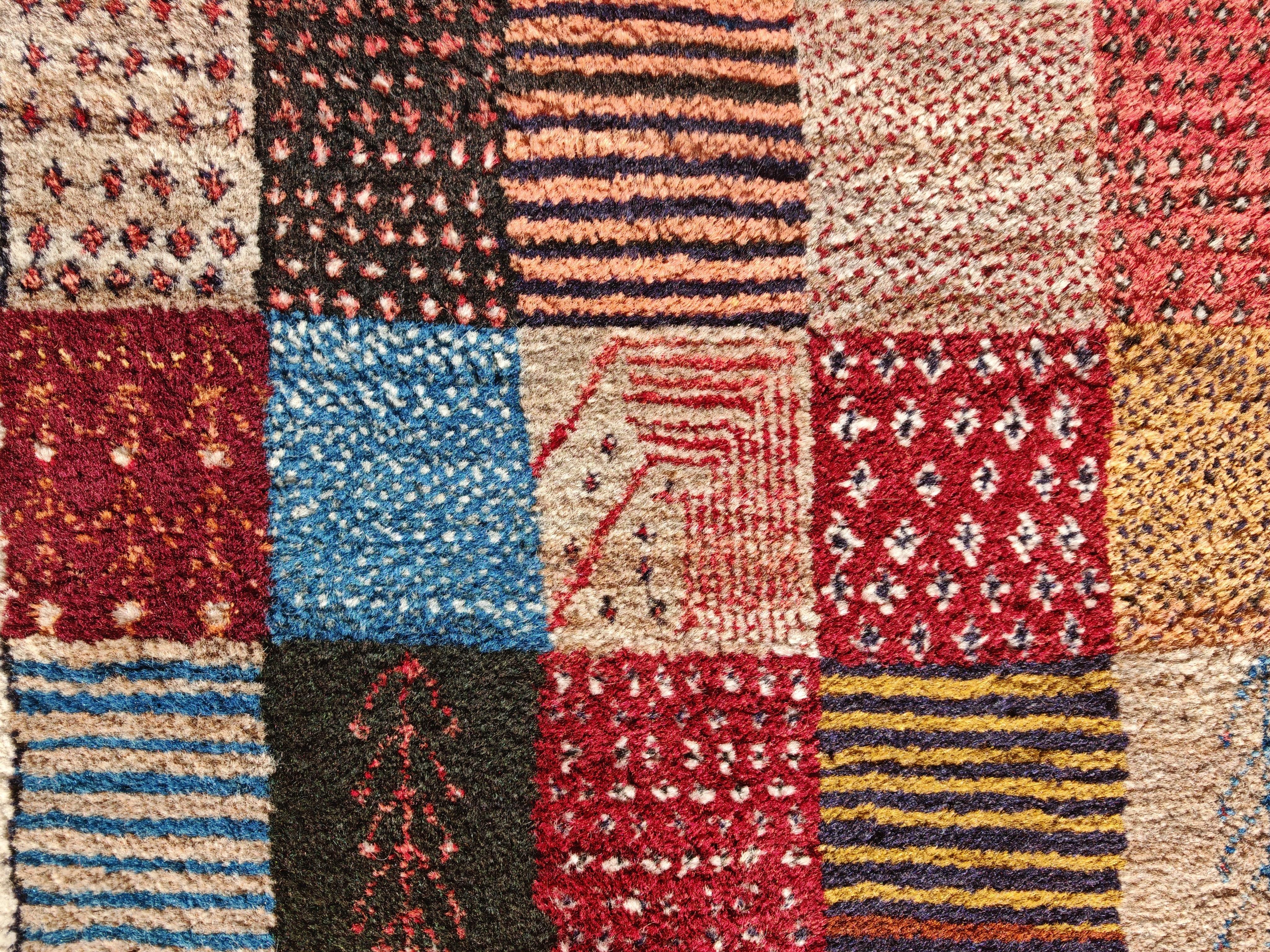 Late 20th Century Unique Persian Gabbeh Runner with geometric and floral pattern, Iran 1990s For Sale