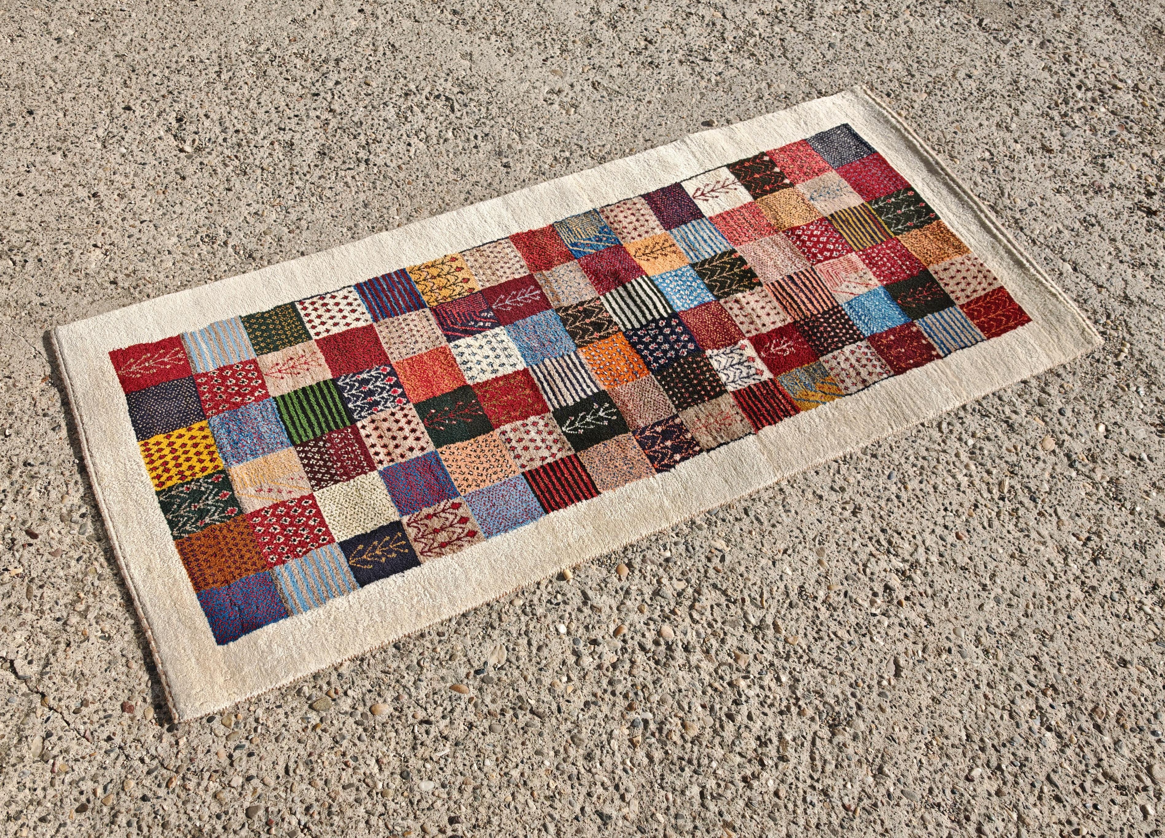 Wool Unique Persian Gabbeh Runner with geometric and floral pattern, Iran 1990s For Sale