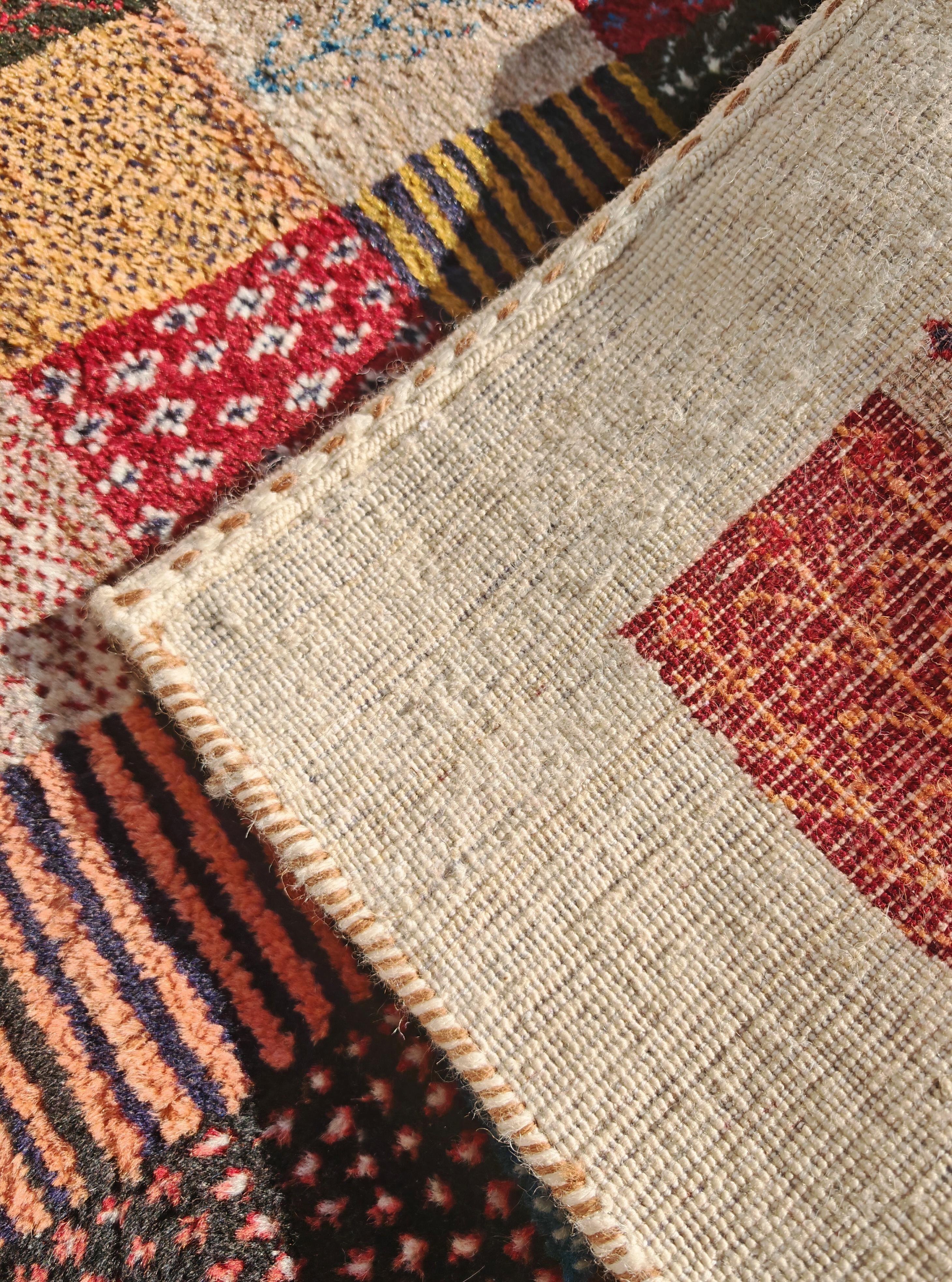 Unique Persian Gabbeh Runner with geometric and floral pattern, Iran 1990s For Sale 1