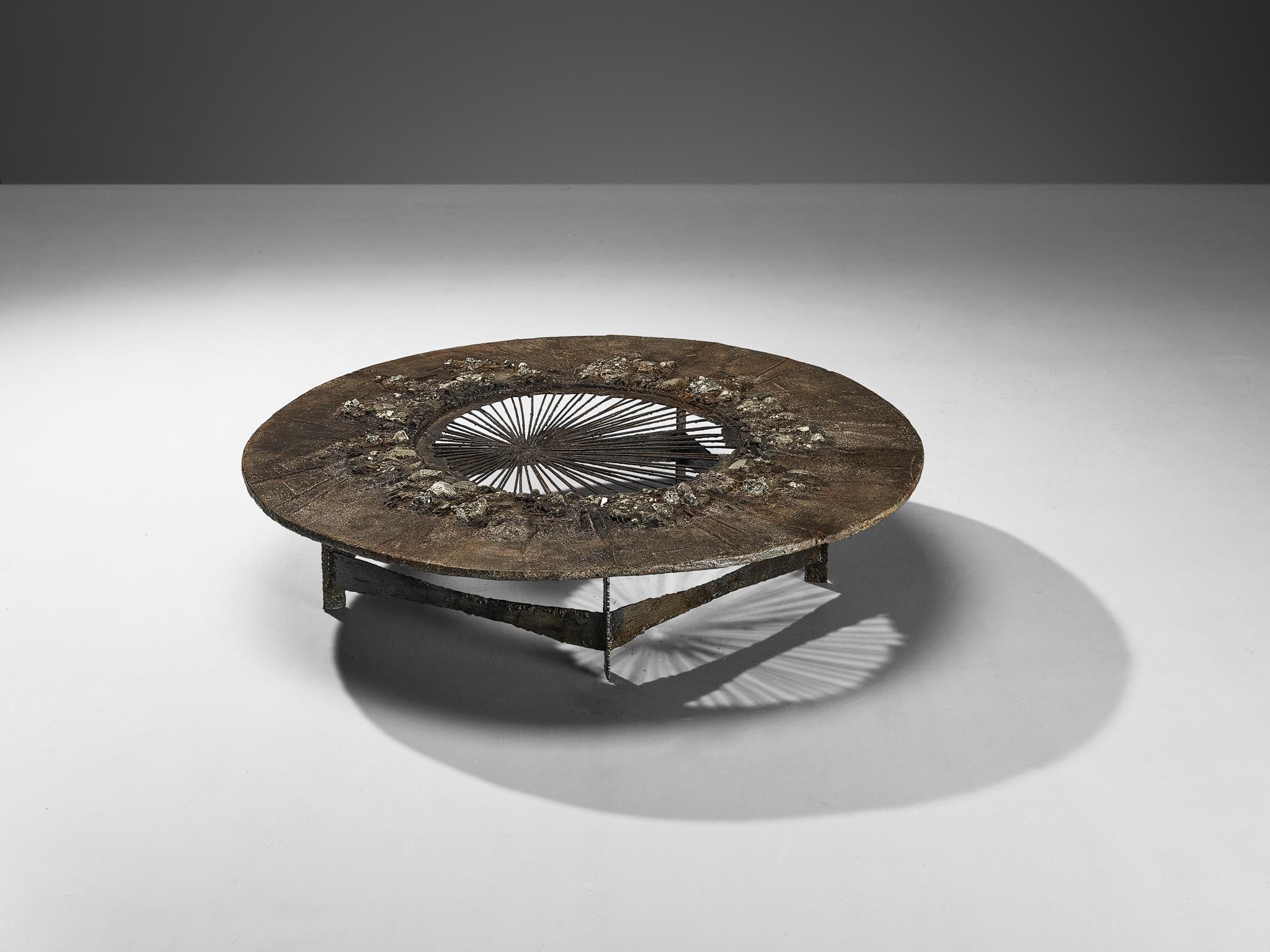 Pia Manu, coffee table, pyrite mineral, Ammonite, iron, burnished concrete, Belgium, 1960s

This rare, handmade coffee table made from a rather surprising juxtaposition of natural materials is designed in the workshop of Pia Manu. What makes this