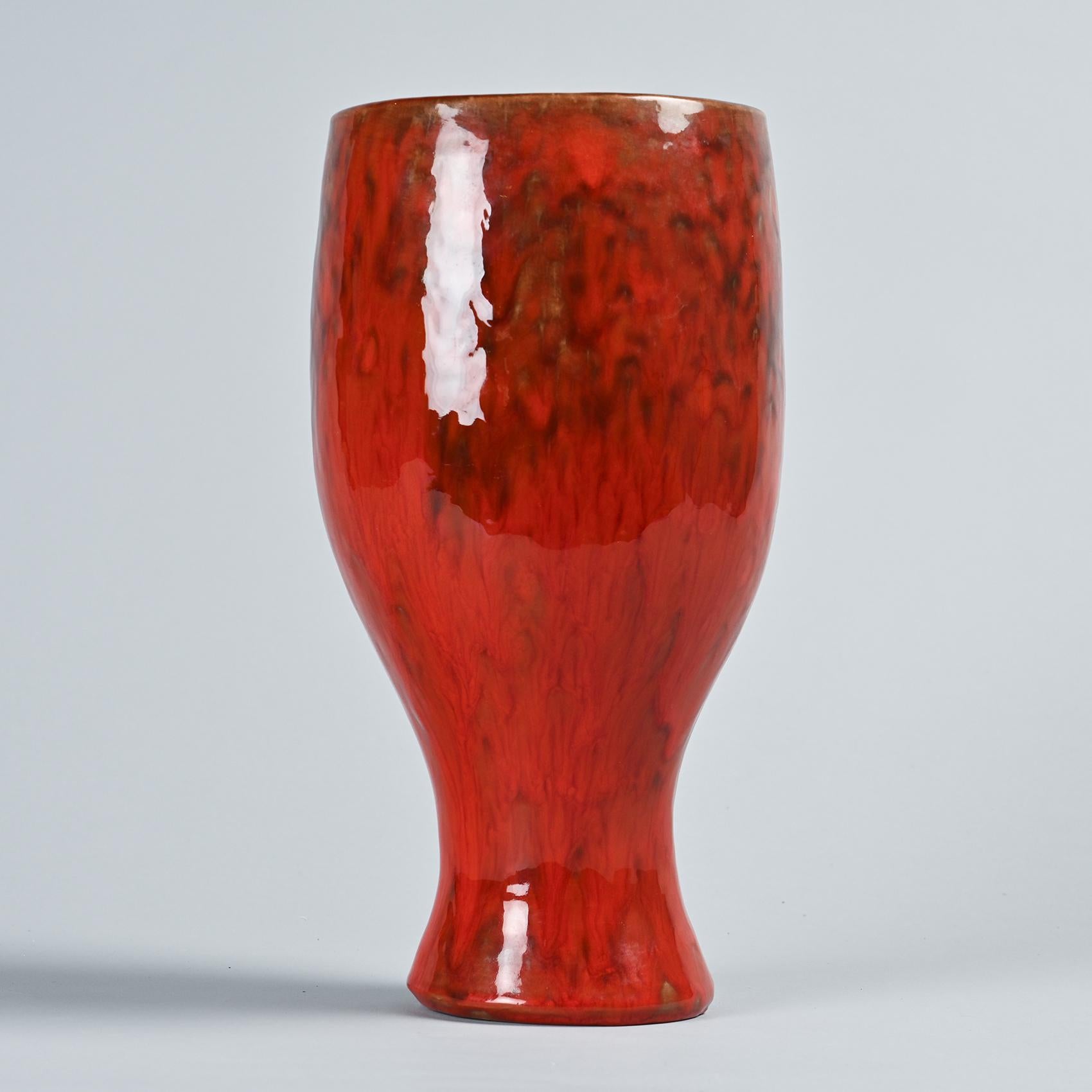 Vase by Robert and Jean Cloutier, twin masters of French ceramics known for their rich and dreamlike creations.

Featuring a cone shape, it is made of mottled red glazed ceramic with a black interior, and is signed.

Signed underneath: Cloutier