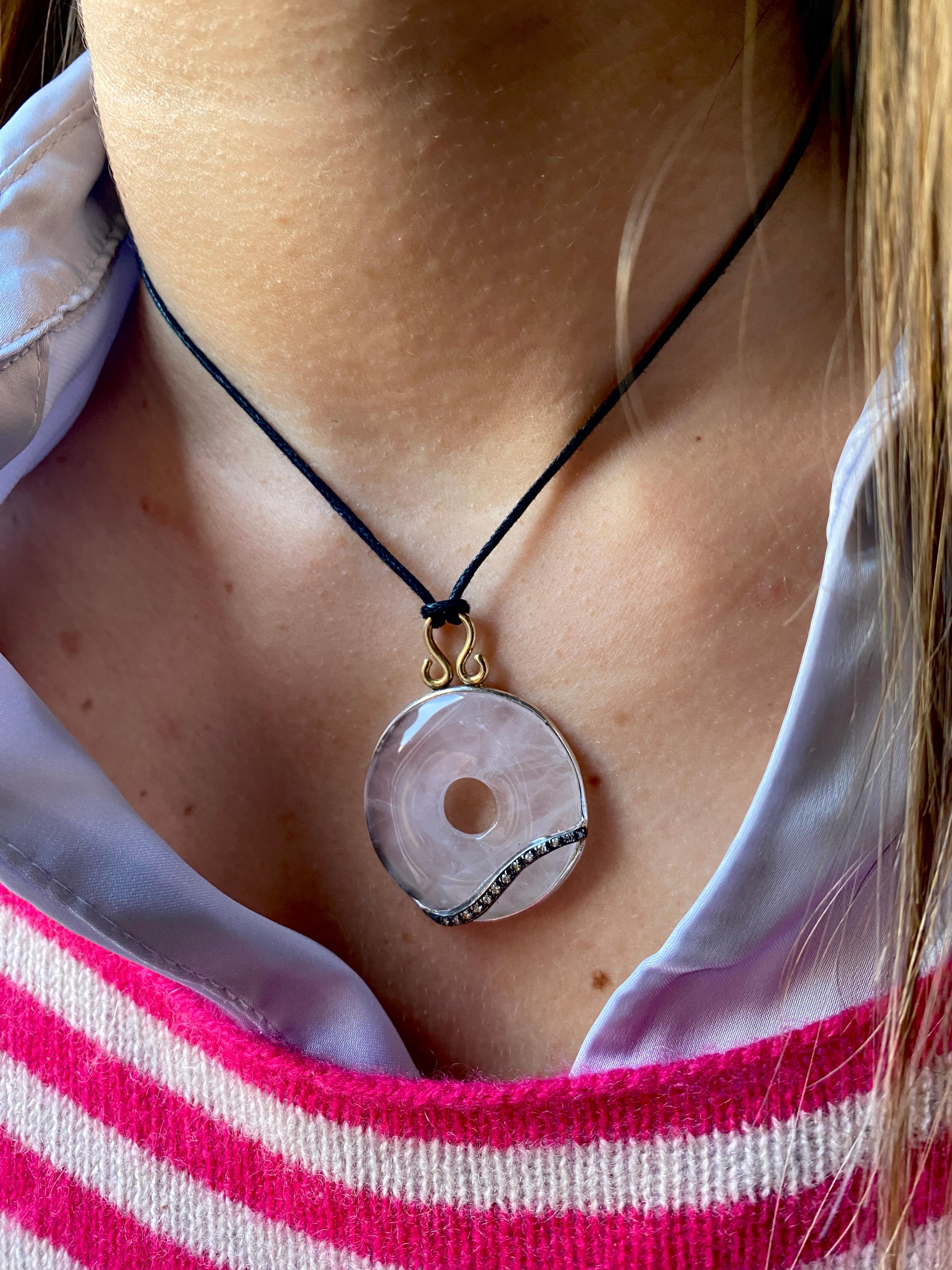 Rossella Ugolini bohemian-style handcrefted pendant made of Silver Sterling and 24 carat Gold plating
This surrealists talisman piece is inspired by the natural beauty of the world around us. 
The branch-like design with Diamonds delicately flowing