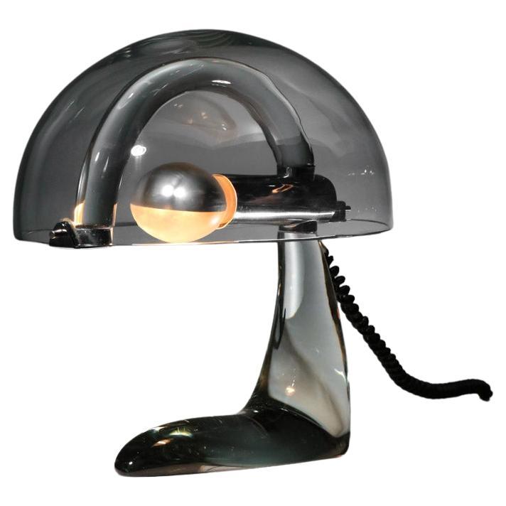 Very rare Italian table lamp from the 70s by Barovier and Toso. Base structure and bell shade in thick transparent Murano glass. Hanging system and socket in chromed metal. Very original design, superb glasswork. Very fine vintage condition, with