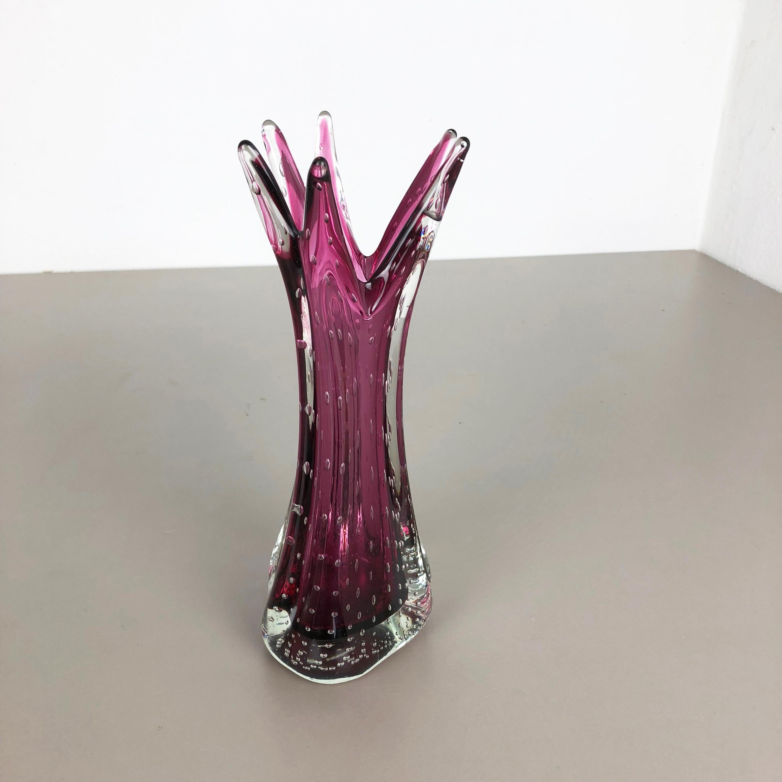 Article:

Murano glass vase element

Origin:

Murano, Italy


Decade:

1970s


This original glass vase was produced in the 1970s in Murano, Italy. An elegant pink Murano glass vase utilizing the bullicante technique of controlled