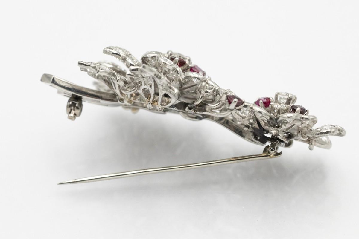 Modern Unique platinum brooch with rubies and diamonds 9.54ct. For Sale