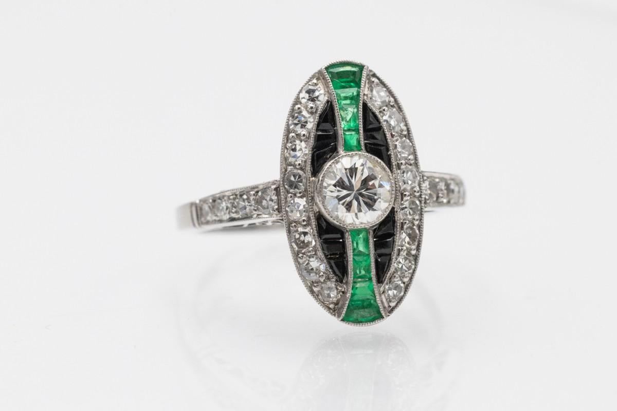Brilliant Cut Unique platinum ring with diamonds, emeralds and onyxes in Art Deco style. For Sale
