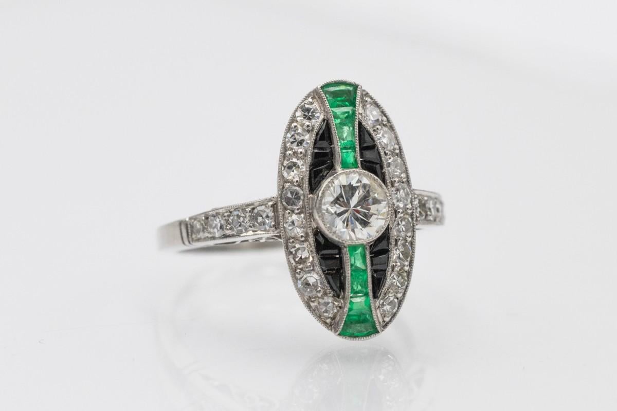 Women's Unique platinum ring with diamonds, emeralds and onyxes in Art Deco style. For Sale