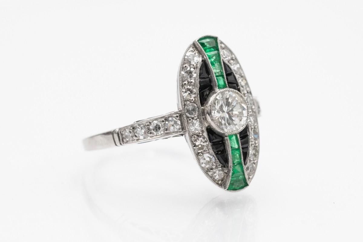 Unique platinum ring with diamonds, emeralds and onyxes in Art Deco style. For Sale 2