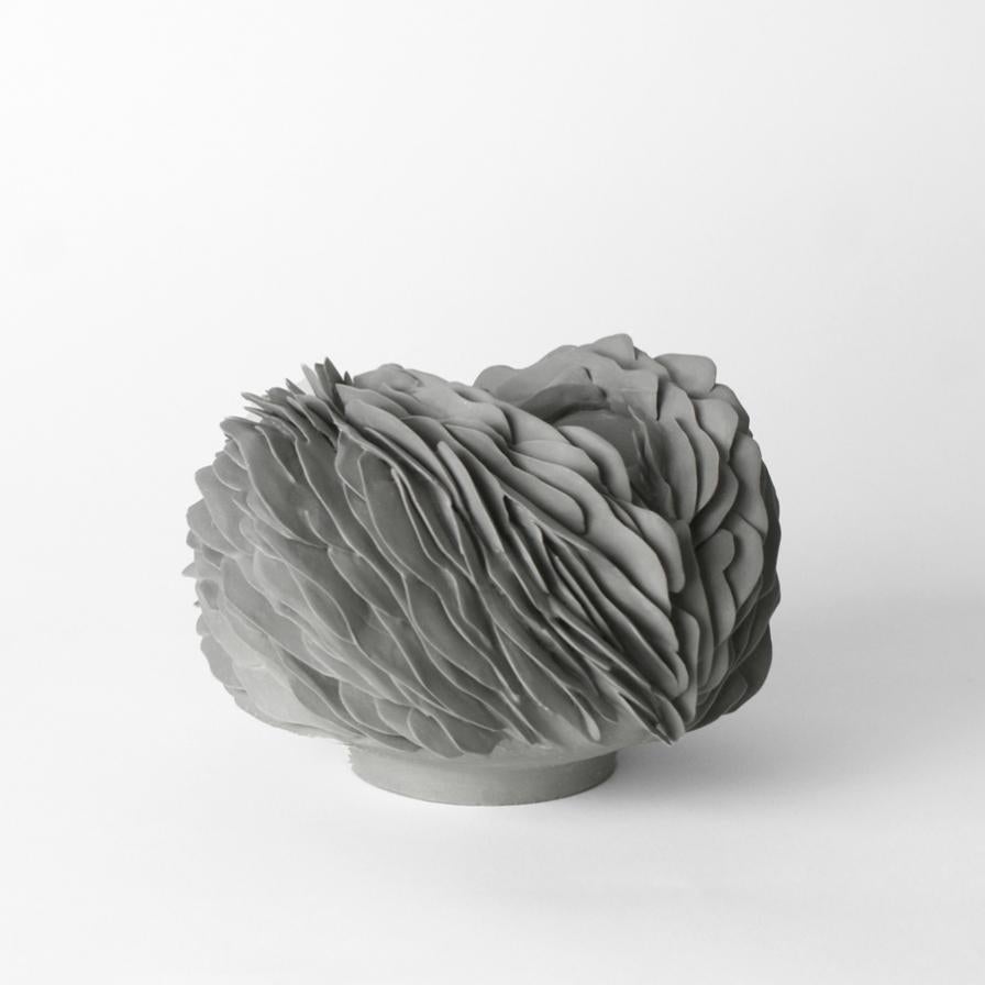 Nest I, 2022 (Porcelain, C. 4.3 in. H x 6.7 in. W x 6.7 in. D., Object No.: 3922)

Olivia Walker works in porcelain to create pieces that explore the symbiotic relationship between growth and decay, as well as the relationship between nature and